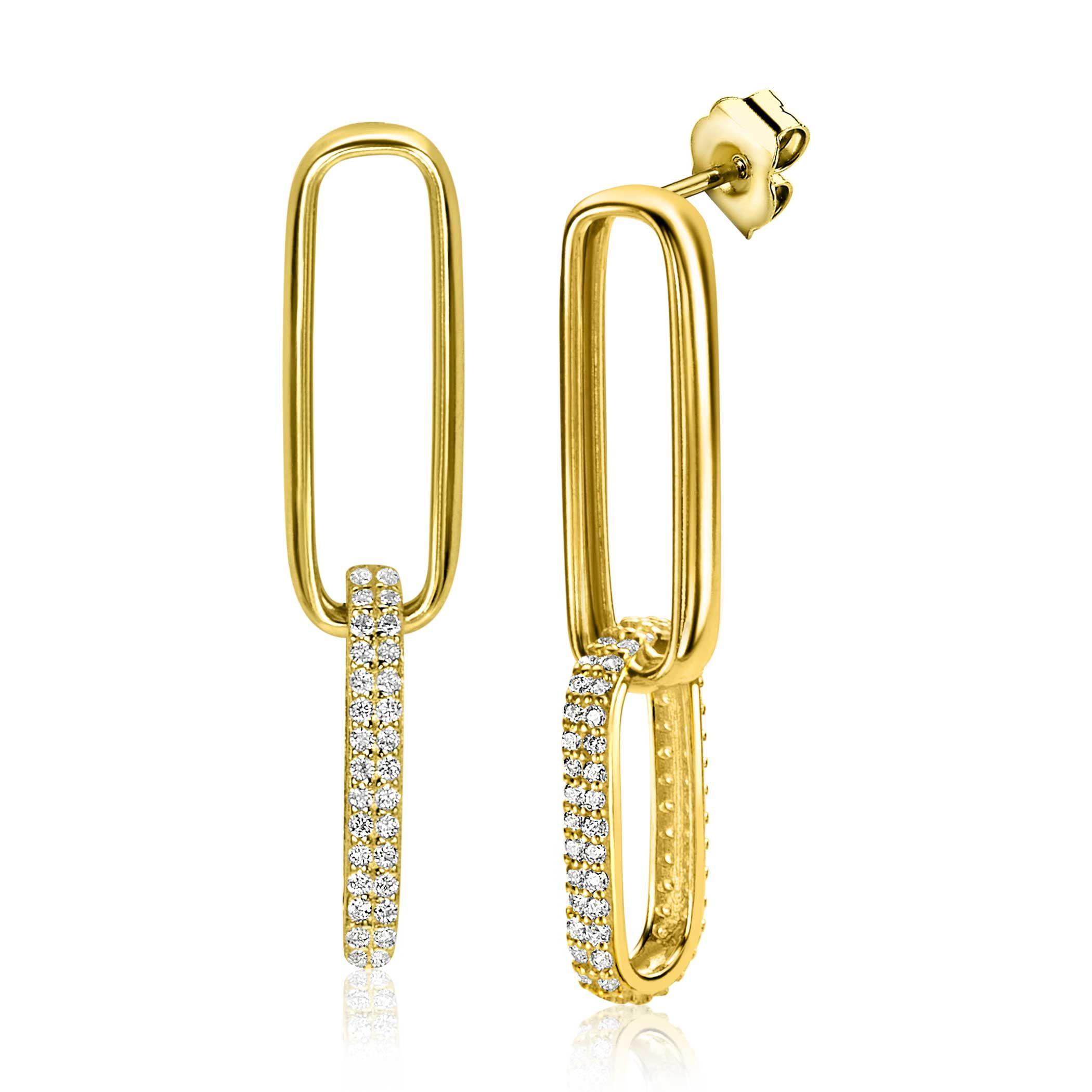 ZINZI gold plated zilveren lange oorsieraden 38mm met twee trendy ovale schakels, waarvan de onderste schakel rondom bezet is met witte zirconia's. Schitterende eyecatchers. Vervaardigd van eerste gehalte zilver (925) en voorzien van een extra 14K geel vergulding.