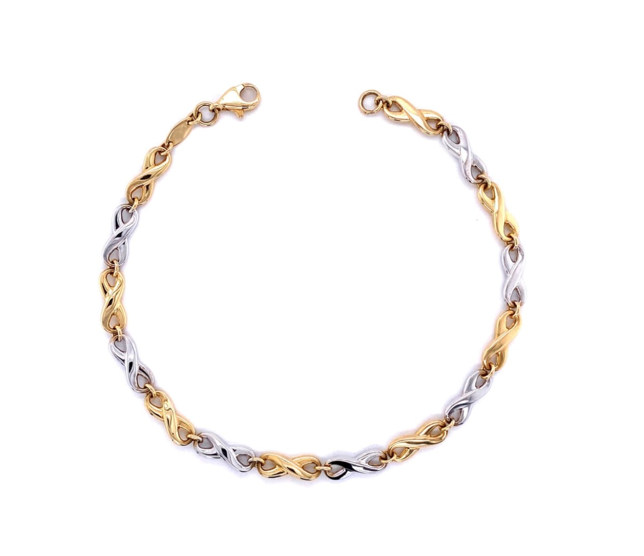 De Huismerk Gouden Bicoler armband is een stijlvolle goudkleurige en zilverkleurige armband, gemaakt van hoogwaardig goud. Deze armband, met een afmeting van 190 mm, valt onder de categorie sieraden en is perfect als luxe accessoire. Draag deze armband solo voor een elegante uitstraling of combineer met andere sieraden voor extra glamour.