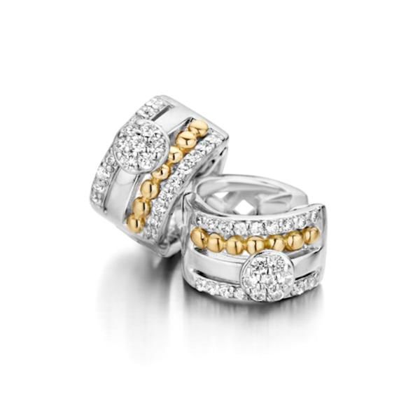 Zilver met 14 karaat gouden creolen en zirkonia's. Deze oorbellen zijnonderdeel van een set.
