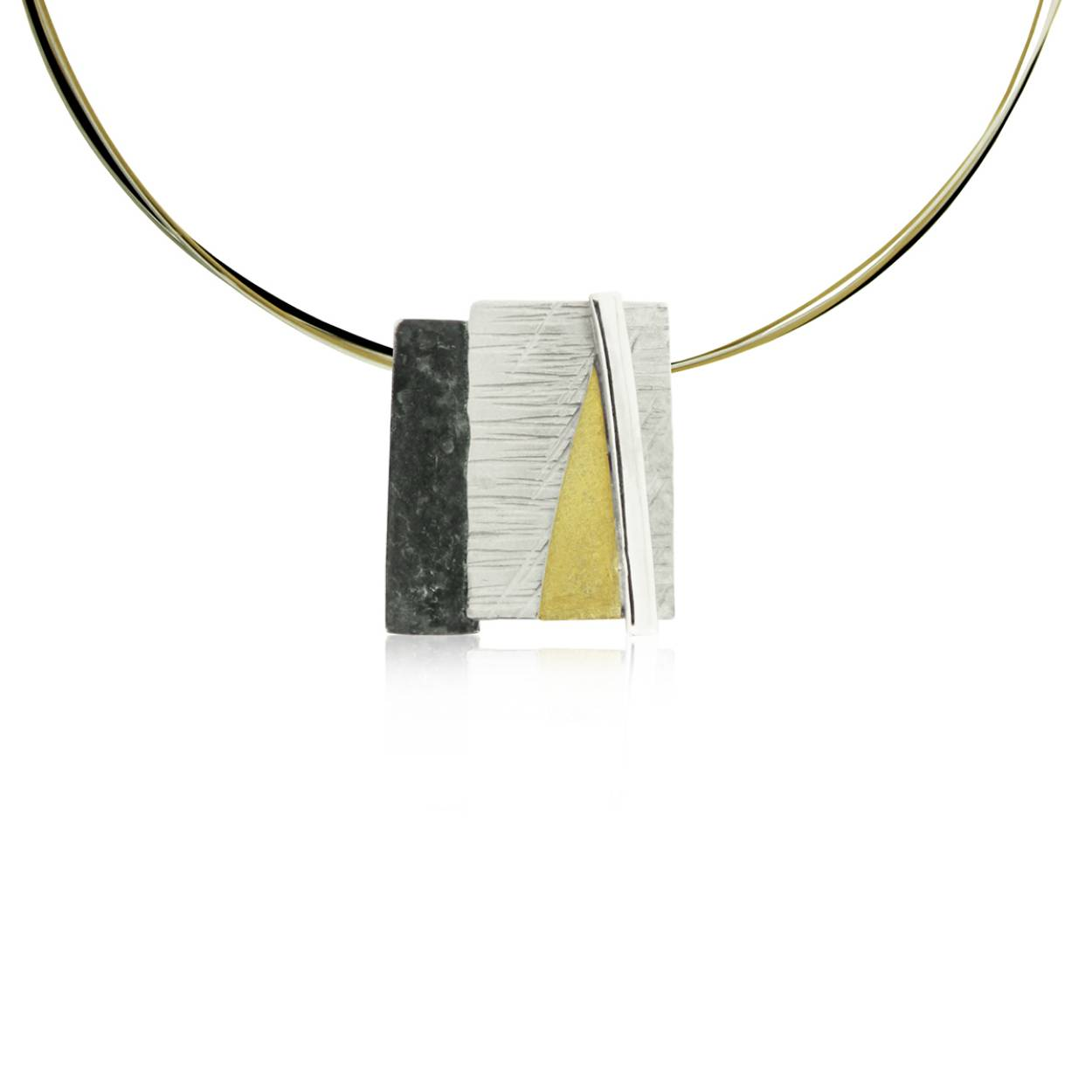 925 white silver pendant combined with oxidized silver and 18k yellow gold.