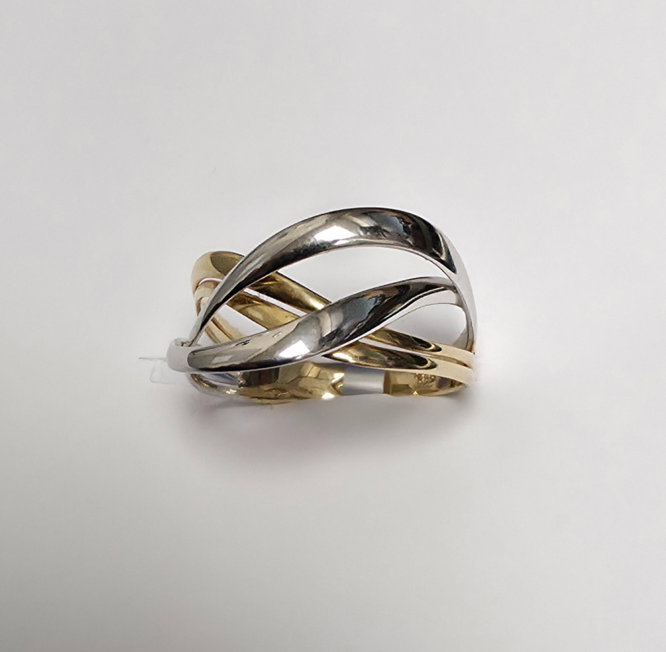 Elegante open gewerkte bicolor ring in 14 kt goud