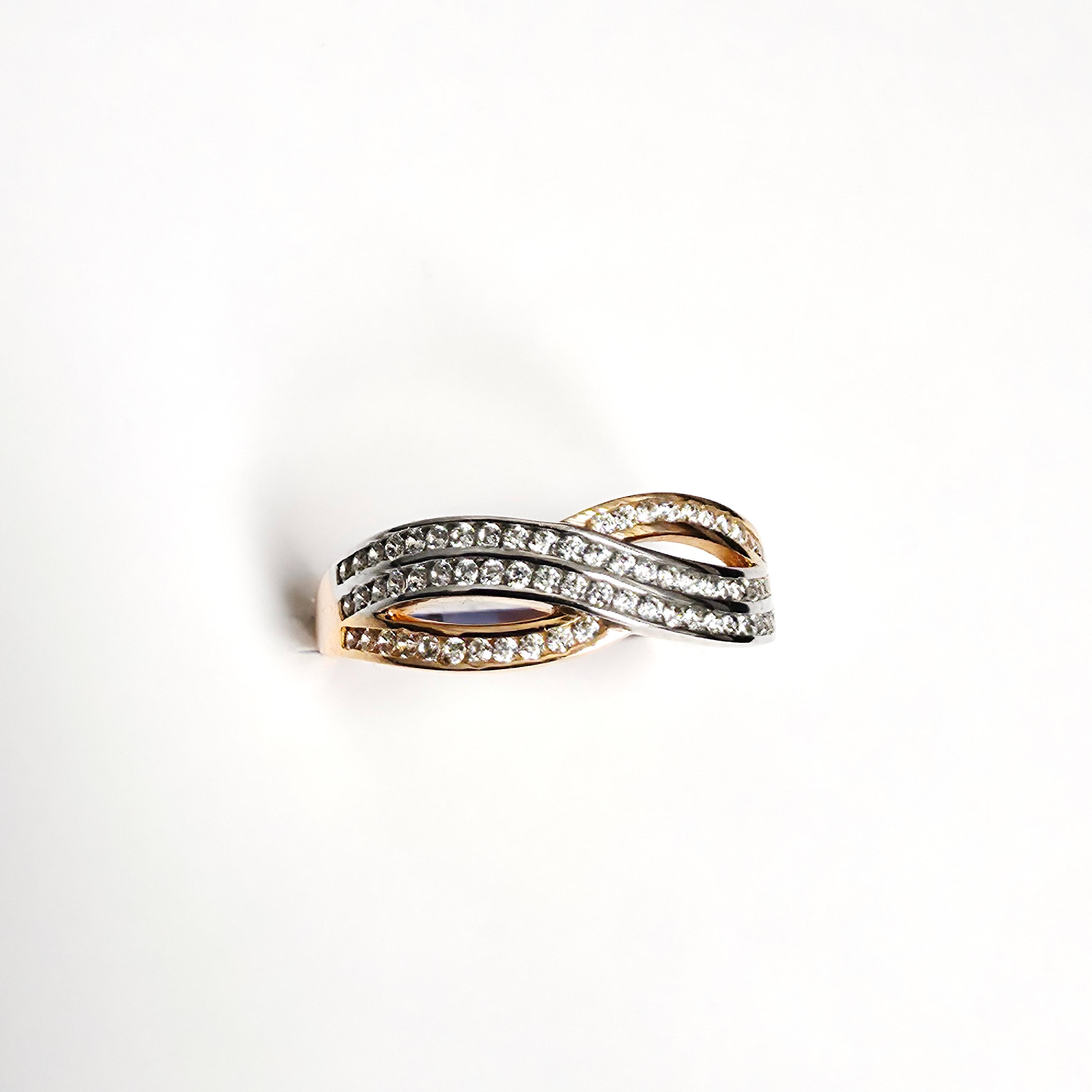 Prachtige fantasie ring met zirkonia bogen ros&eacute; met witgoud