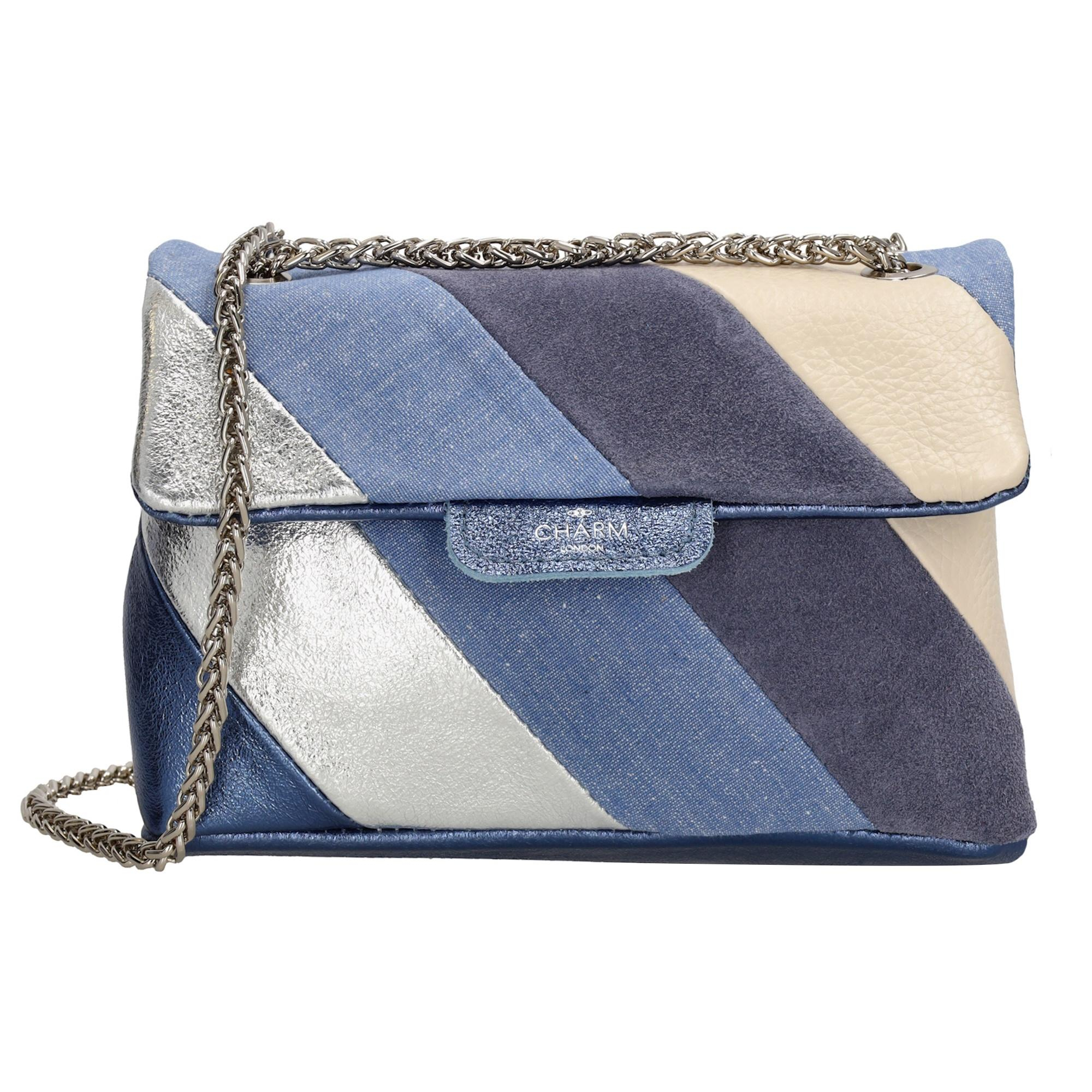 Leukerd h&egrave;, dit schoudertasje uit de Elisa collectie van Charm London! Met dit tasje over je schouder ga jij zekerweten stijlvol op pad! Door het handzame formaat neem je 'm gemakkelijk mee naar een dagje weg of avondje uit! Het hoofdvak van de tas, dat in twee&euml;n verdeeld is, sluit door middel van een overslag. Je (kostbare) spullen draag je dus veilig bij je! Je draagt 'm gemakkelijk over je schouder aan de stoere schouderband. Shine jij straks met deze toffe schoudertas? 

De tassen van Charm London zijn ge&iuml;nspireerd op de iconische Britse modehoofdstad Londen. Ze zijn ge&iuml;nspireerd op de luxueuze materialen en typerende modellen die daar te zien zijn. Fashionable en stijlvolle damestassen van echt leer of kunstleer, gemaakt zodat jij er elke dag fantastisch uit kunt zien! 

De eigenschappen van deze schoudertas zijn:

Hoofdvak met ritssluiting 
Schouderband 