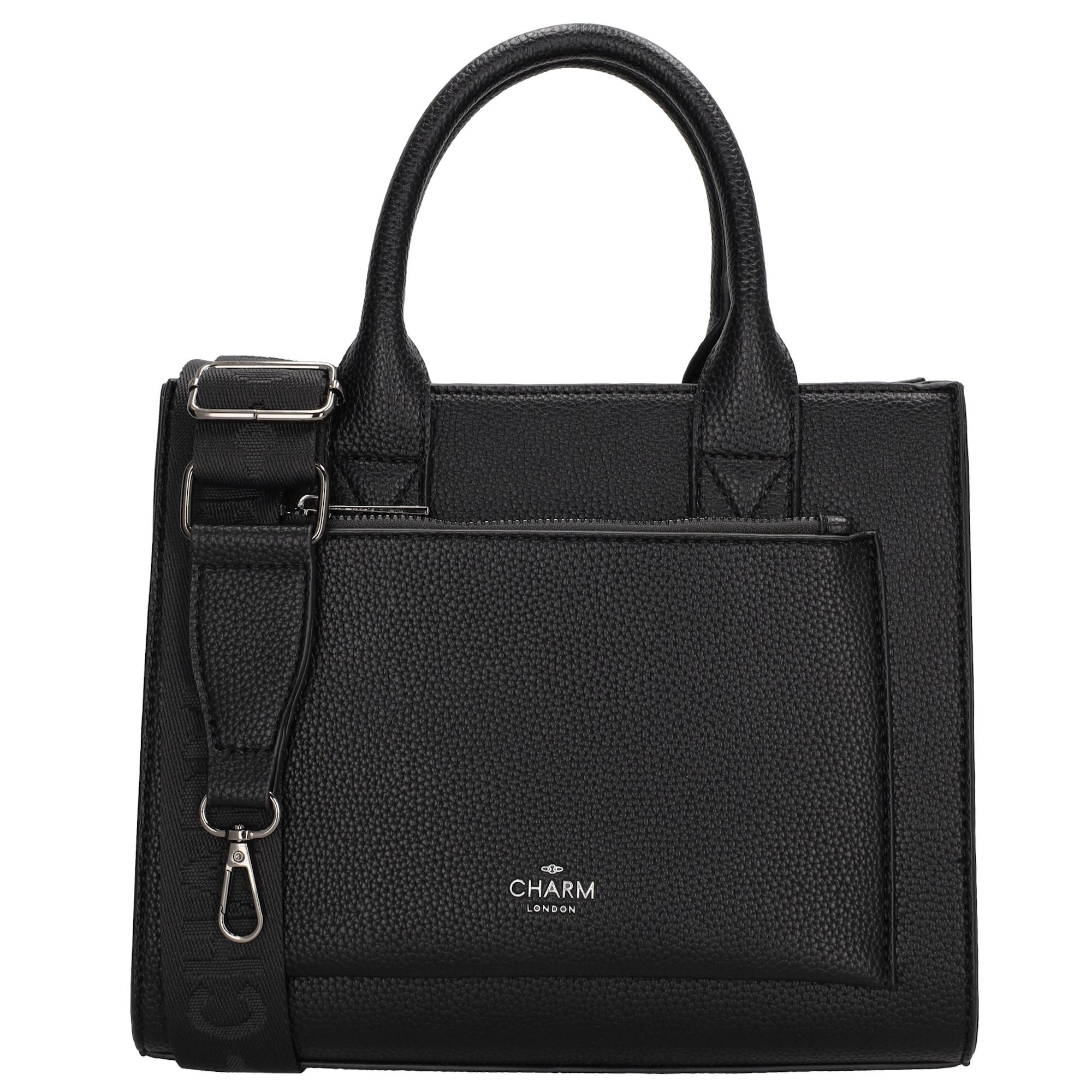 De Charm London Pentonville Handtas is een elegante en functionele tas, perfect voor dagelijks gebruik. Het ruime hoofdvak biedt voldoende ruimte voor je essentials en is voorzien van een telefoonvak en een extra ritsvak aan de binnenkant. Aan de buitenkant bevindt zich een handig ritsvak aan de voorkant voor snelle toegang tot kleinere spullen. Dankzij de verstelbare en afneembare schouderband kan de tas ook handsfree gedragen worden op de gewenste hoogte. De ritssluiting zorgt ervoor dat je spullen veilig opgeborgen blijven.

Kenmerken:

Hoofdvak met telefoonvak en ritsvak binnenin
Ritsvak aan de voorkant
Afsluitbaar met een rits
Verstelbare en afneembare schouderband
