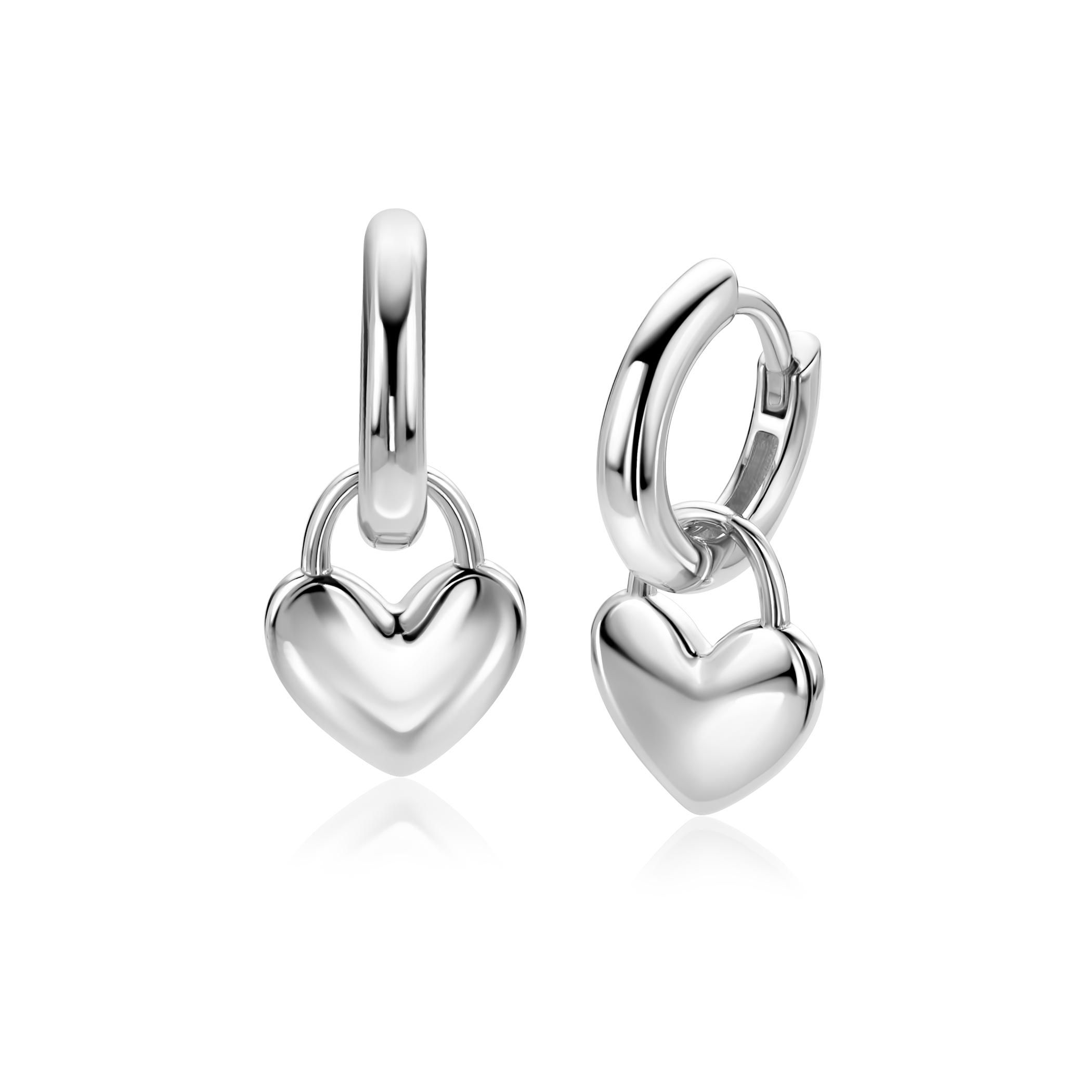 ZINZI zilveren oorbedels met glanzend hart 9mm, prachtig in zijn eenvoud. De oorbedels zijn vervaardigd van eerste gehalte zilver (925) en voorzien van een extra rodiumlaag voor een langdurige glans.