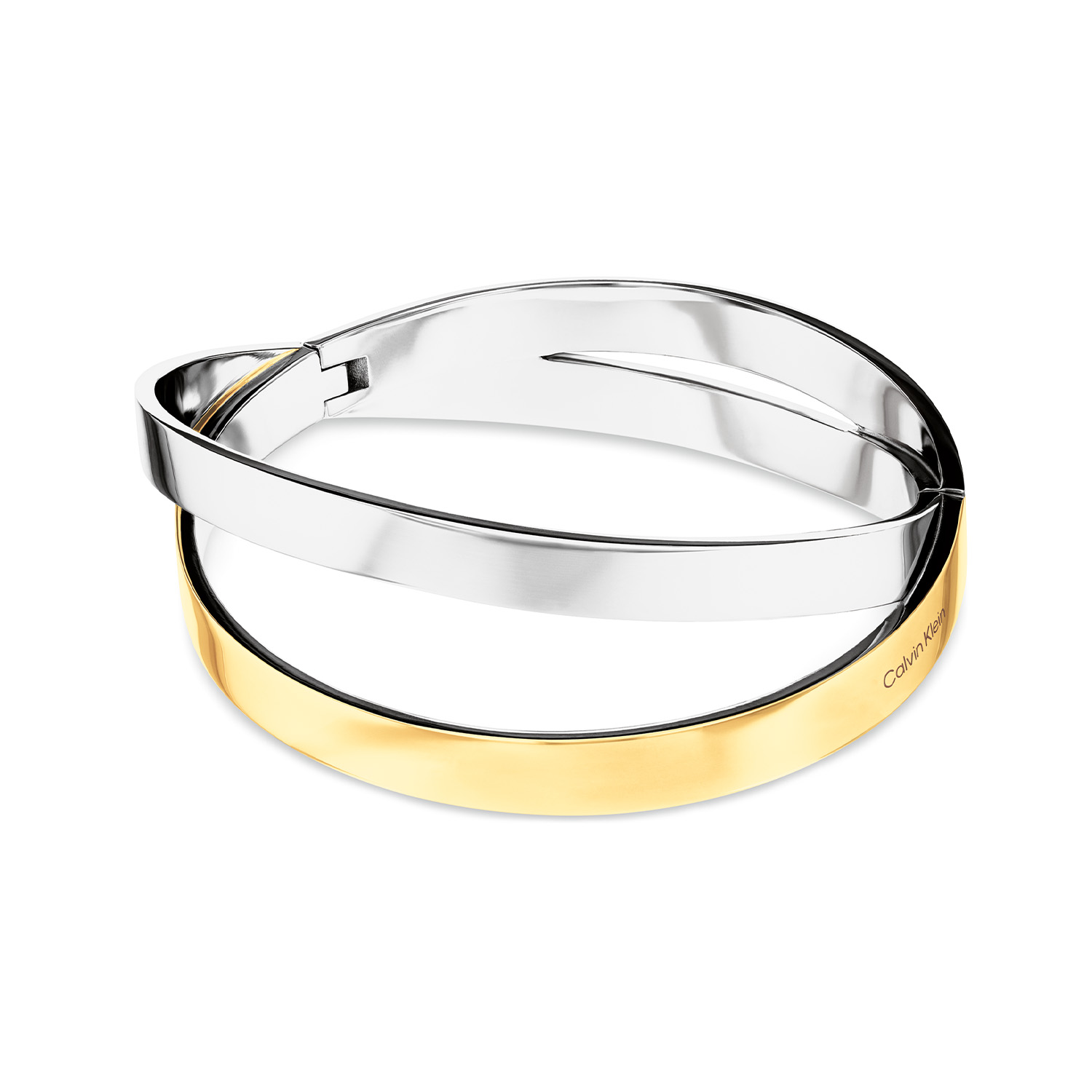 Calvin Klein CJ35000852 Dames Bangle Staal Bico
Deze stalen dames bangle van Calvin Klein met nr CJ35000852 heeft een strak uiterlijk. De stijve bicolor armband heeft onderscheidende iconen, is glimmend, ong 30mm breed, en geschikt voor een pols van 17,5cm. De dubbele scharniersluiting is vrijwel onzichtbaar. Leuk te combineren met andere sieraden uit de serie van Calvin Klein.

OVER CALVIN KLEIN
Calvin Klein is een wereldwijd lifestylemerk dat gewaagde, vooruitstrevende idealen en een verleidelijke, vaak minimalistische, esthetiek nastreeft. Calvin Klein werd groot in de jaren 70 door haar mode- en merkjeans collecties. In de jaren 80 lanceerde Calvin Klein haar spraakmakende ondergoed dat uitdrukkelijk van logo &rsquo;s voorzien was. Vanwege het grote succes is het merk ook succesvol uitgerold in Accessoires, Parfums, Home, Brillen, Golf, Horloges en Sieraden.
Sinds de oprichting in 1968 door Calvin Klein, heeft het merk haar reputatie opgebouwd als leider in de Amerikaanse mode, dankzij een cleane esthetiek en innovatieve ontwerpen. Calvin Klein wil haar publiek verleiden en inspireren door middel van provocerende beelden en opvallende ontwerpen die prikkelen. 

SPECIFICATIES:
- Stalen dames bangle
- 19,5cm
- Bicolor zilver/ goudkleurig
- Glimmend