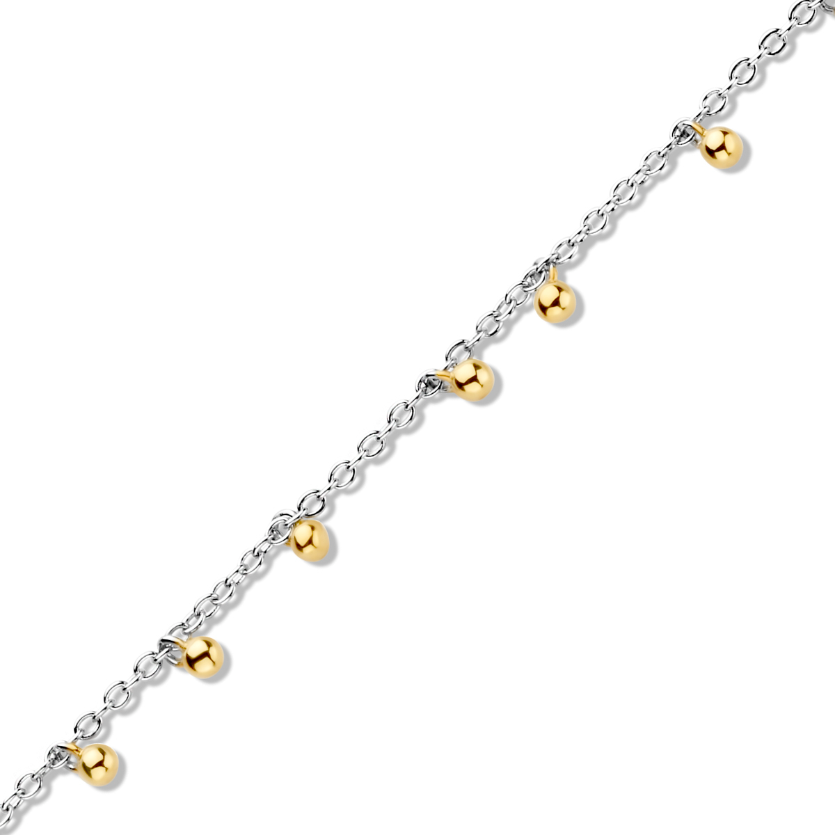 Armband  zilver met hangende geelkleurige bolletjes