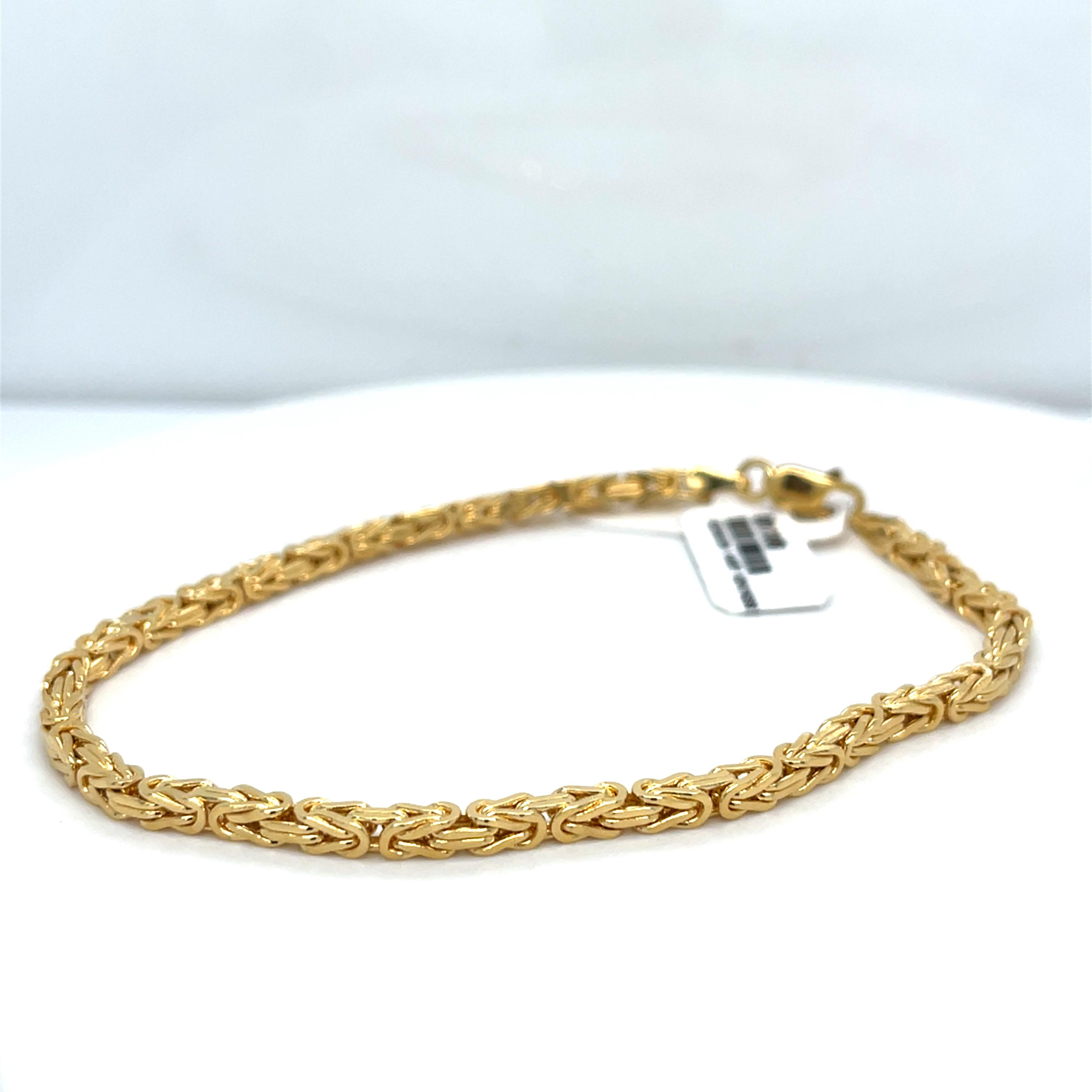 Geelgouden koningsschakel armband van 14 karaat
lengte 20.5cm
gewicht 11.7gr