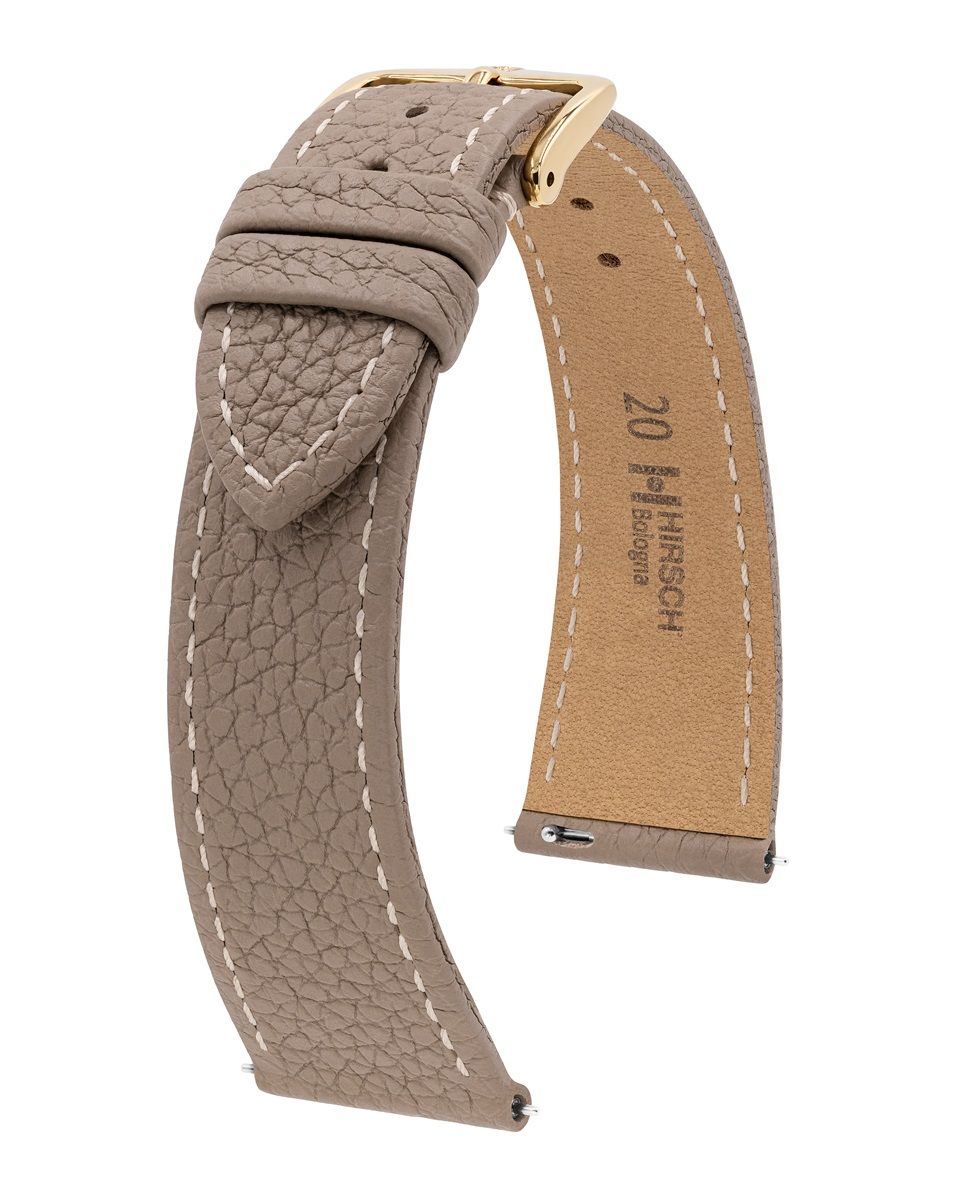 Een elegante horlogeband van hoogwaardig kalfsleer in een stijlvolle taupekleur. De verfijnde afwerking en het comfortabele draaggevoel maken deze band perfect voor zowel dagelijks gebruik als formele gelegenheden.