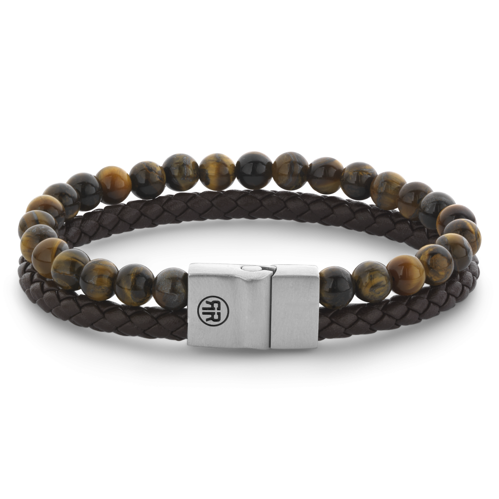 Deze Full Metal armband van Rebel and Rose is een combinatie armband van leer en beads die samenkomen in een 12 mm brede edelstalen sluiting. De kralen (Tijgeroog) zijn 6mm en de leren band is 5mm breed. De unieke (PSR*) sluiting bestaat uit twee delen die perfect in elkaar vallen, zonder dat daar hulpmiddelen als magneten voor nodig zijn.