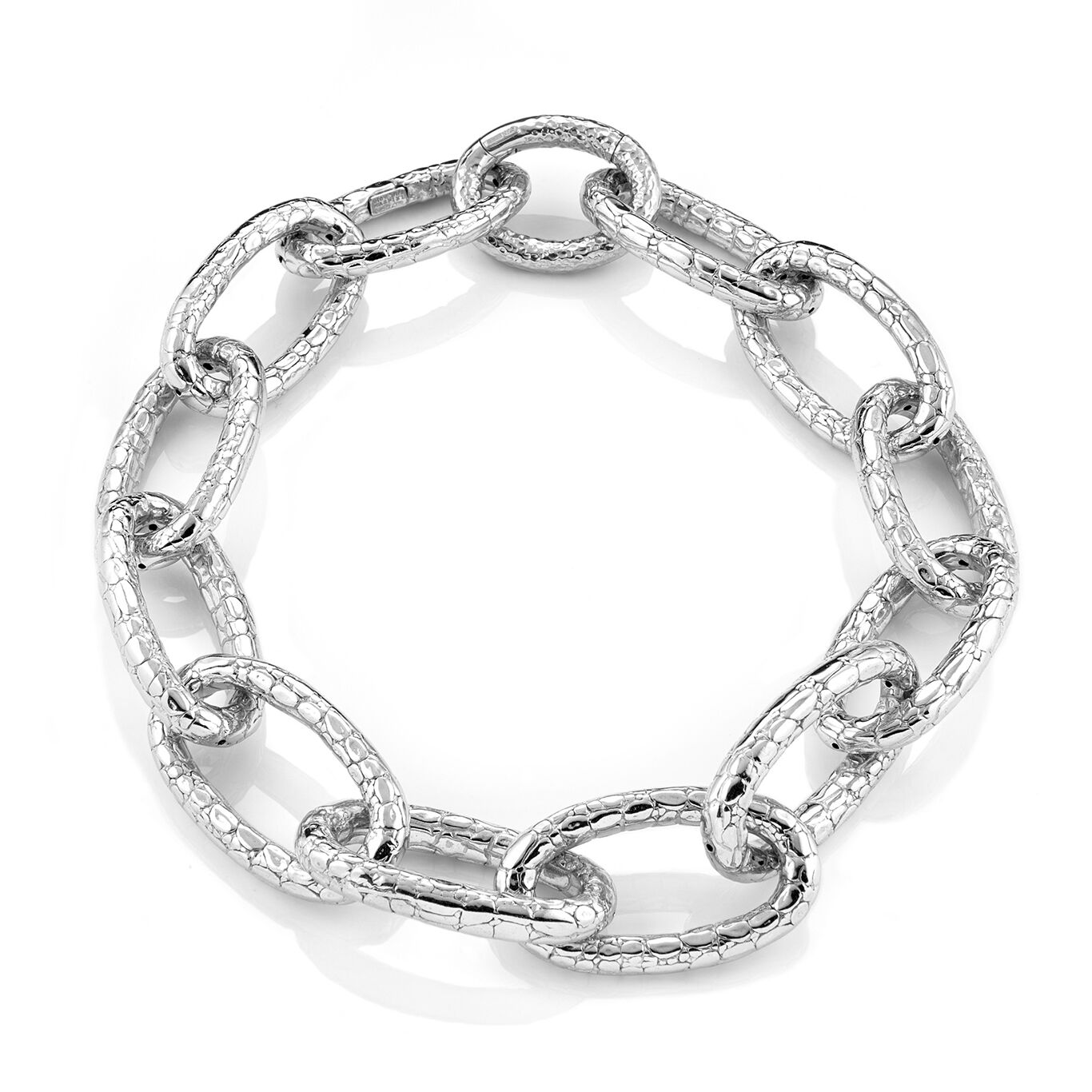 Crocodile textures and animalier passion. This striking silver necklace radiates brilliance and lightness. The essence of style and beauty. Handcrafted.