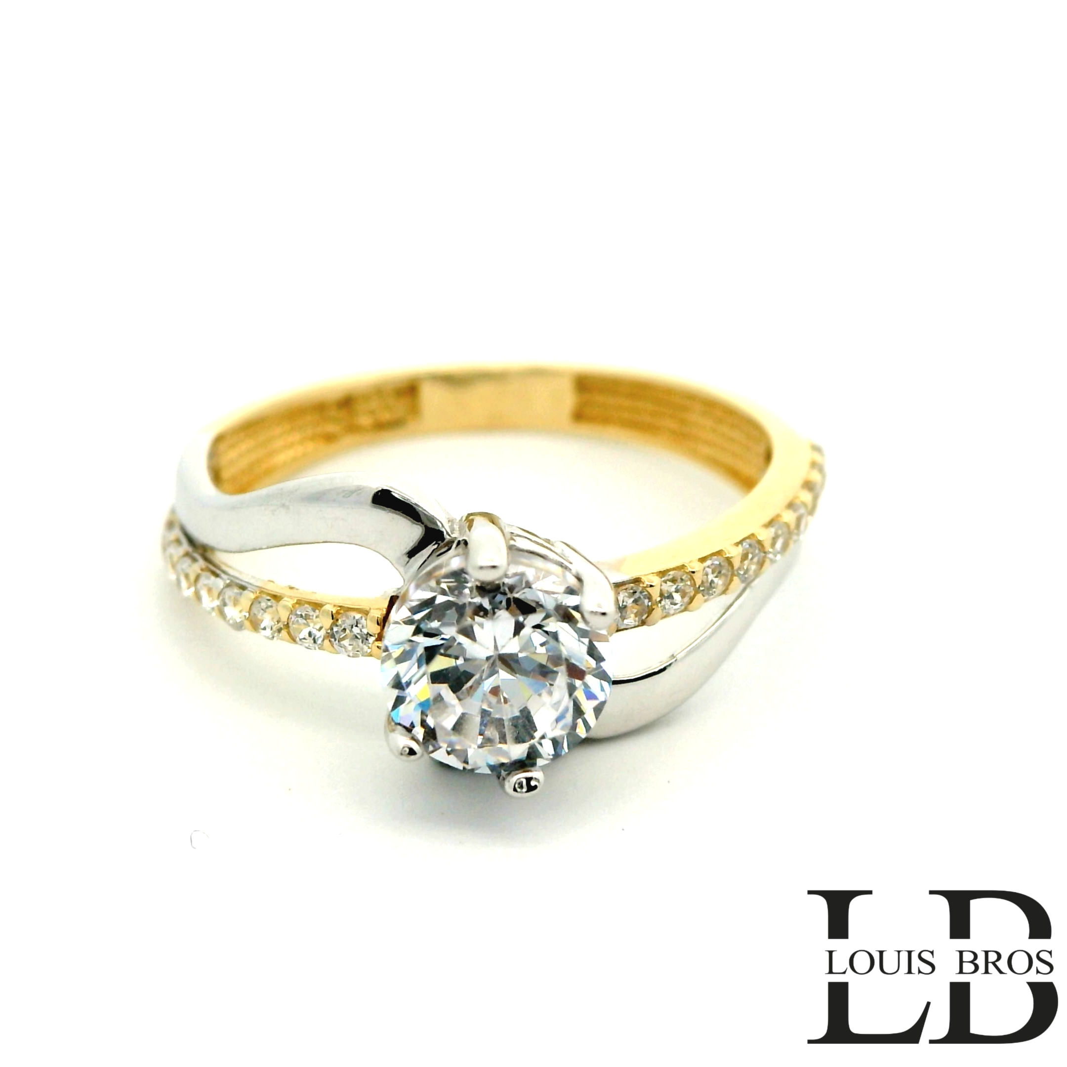 Deze verfijnde damesring is vervaardigd uit 14 karaat bicolor goud (2.41 gr), een harmonieuze combinatie van geelgoud en witgoud. De ring is bezet met fonkelende zirkonia&rsquo;s, die het licht op een prachtige manier weerkaatsen en de ring een luxueuze uitstraling geven zonder te overheersen.

Het subtiele design zorgt voor een elegante en moderne look die moeiteloos bij elke stijl past. De zachte lijnen en het samenspel van de twee goudkleuren maken dit sieraad tijdloos en perfect voor dagelijks gebruik of speciale gelegenheden.

Specificaties:

Materiaal: 14 karaat bicolor goud (geel- en witgoud)

Steensoort: Zirkonia&rsquo;s

Stijl: Subtiel, elegant & tijdloos

Doelgroep: Dames

Afwerking: Hoogglans gepolijst

Bijzonderheden: Luxe uitstraling door de combinatie van twee goudkleuren en sprankelende zirkonia&rsquo;s

Bijzonderheden:
Een ring die verfijning en eenvoud prachtig samenbrengt &ndash; perfect voor de vrouw die houdt van subtiele luxe met een moderne touch.
De ring is verkrijgbaar in meerdere afmetingen.