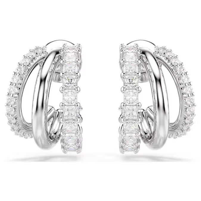 Deze ingenieus vervaardigde Hyperbola-oorbellen zijn van een unieke schoonheid. Aan elke kant zijn de drie mini-ringen voorzien van een rhodium toplaag, versierd met Swarovski Zirkonia in Round- en Square-slijpvorm in een klauwzetting. Combineer ze met een bijpassende armband of hanger voor een adembenemende look.