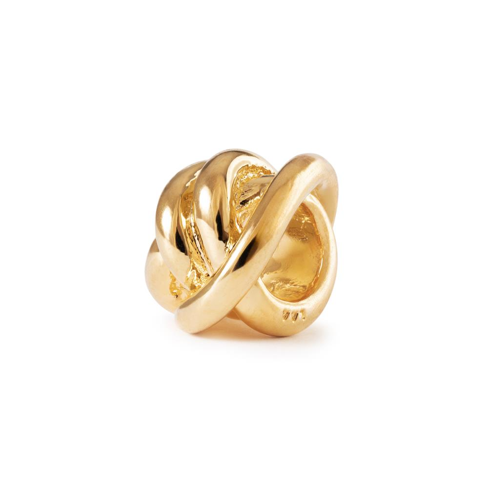 De Trollbeads bedel Geluksknoop met modelnummer TGPBE-30003 is verguld en ontworpen voor sieradenliefhebbers. Deze bedel heeft een verfijnd en elegant ontwerp dat symbool staat voor geluk. Draag het aan een armband of ketting om een persoonlijke en betekenisvolle touch aan je sieradencollectie toe te voegen. Perfect om jezelf of een dierbare cadeau te doen.