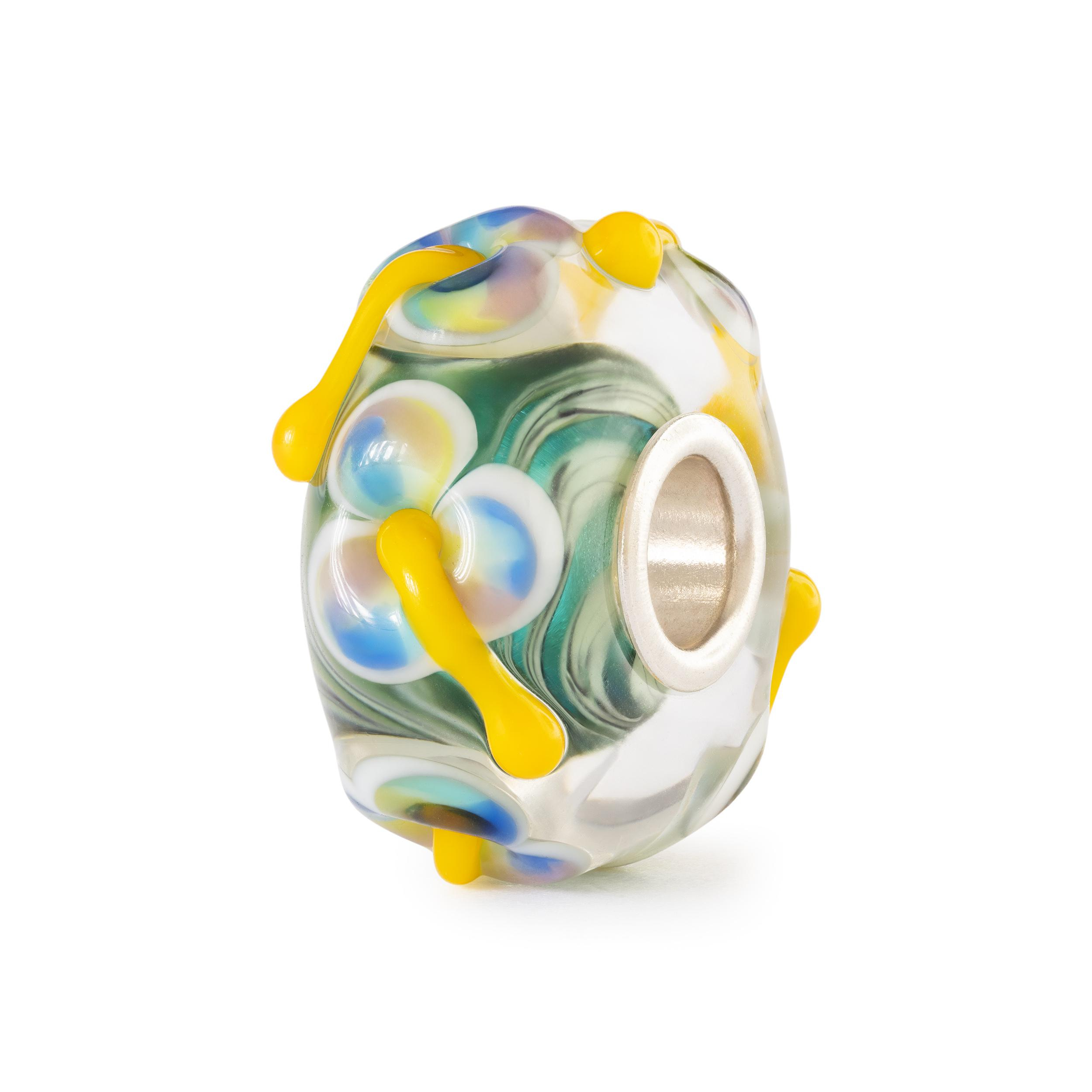 Trollbeads Fee&euml;nbloem TGLBE-20473 &mdash; betoverende edelsteenbedel met zachte tinten turquoise, geel en gouden glans. Symboliseert magie, nieuwe dromen en de energie van het vroege lentelicht. Verkrijgbaar bij Juwelier Schouten &ndash; Middenwaard, Heerhugowaard.