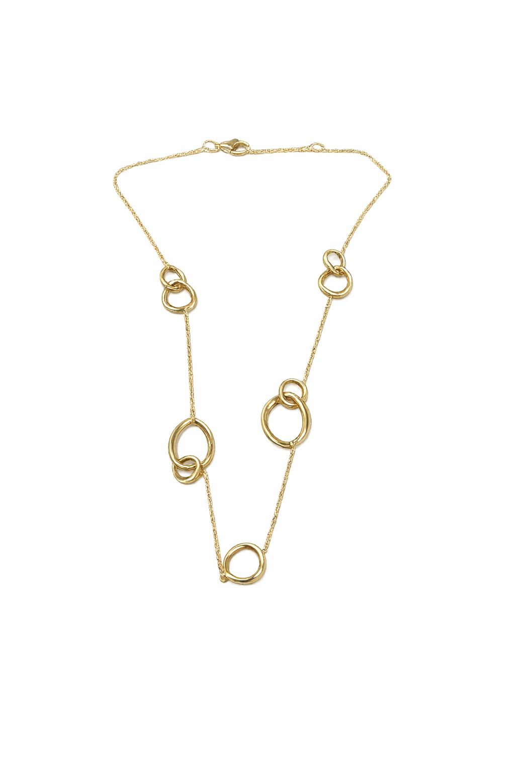 Het Italo Bottene gouden collier, modelnummer CO0614-S, is een elegant sieraad voor elke gelegenheid. Deze 45 cm lange ketting van puur goud voegt verfijning toe aan elke outfit. Perfect voor zowel formele als casual gelegenheden, dit collier kan solo gedragen worden of in laagjes met andere kettingen voor een trendy look. Een must-have voor elke sieradencollectie!