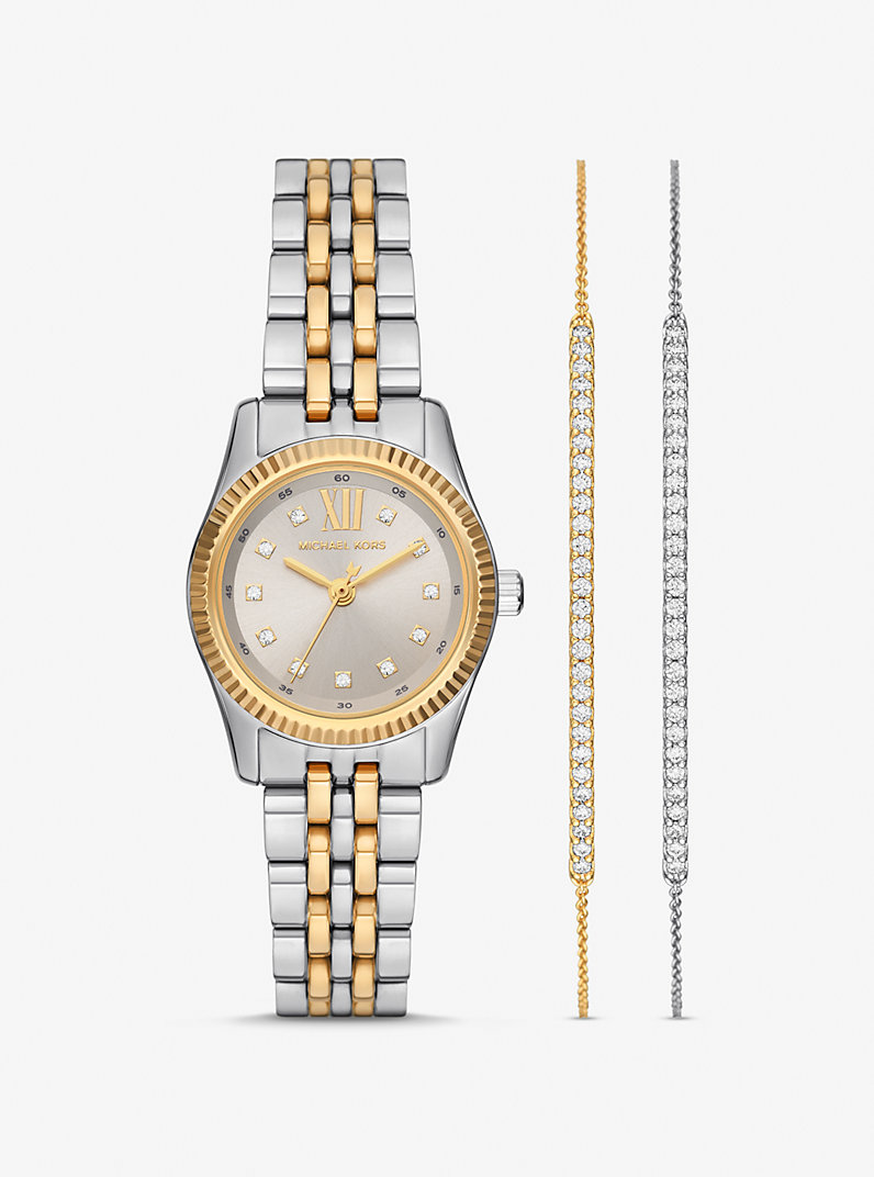 Maak kennis met de Lexington MK4815SET, de perfecte aanvulling op jouw accessoires! Dit stijlvolle analoge horloge van Michael Kors is speciaal ontworpen voor dames die houden van een vleugje elegantie en luxe in hun dagelijkse look. Met een kastdiameter van 26 mm en een bandbreedte van 14 mm, past dit horloge perfect om je pols en voegt het een verfijnde touch toe aan elke outfit.

De combinatie van roestvrij staal in zowel de kast als de band zorgt niet alleen voor een moderne uitstraling, maar ook voor duurzaamheid. Het zilverkleurige wijzerplaat geeft een frisse en chique look, terwijl de 2-tone afwerking een speelse twist biedt. Of je nu een dagje uit gaat of een avondje uit, dit horloge is de ideale metgezel.

Met een waterbestendigheid van 5 ATM hoef je je geen zorgen te maken over spetters of een regenbui. Het quartz uurwerk zorgt ervoor dat je altijd op tijd bent, terwijl de vouwsluiting ervoor zorgt dat het horloge veilig om je pols blijft zitten. Voeg de Lexington MK4815SET toe aan je collectie en laat je stijl stralen!