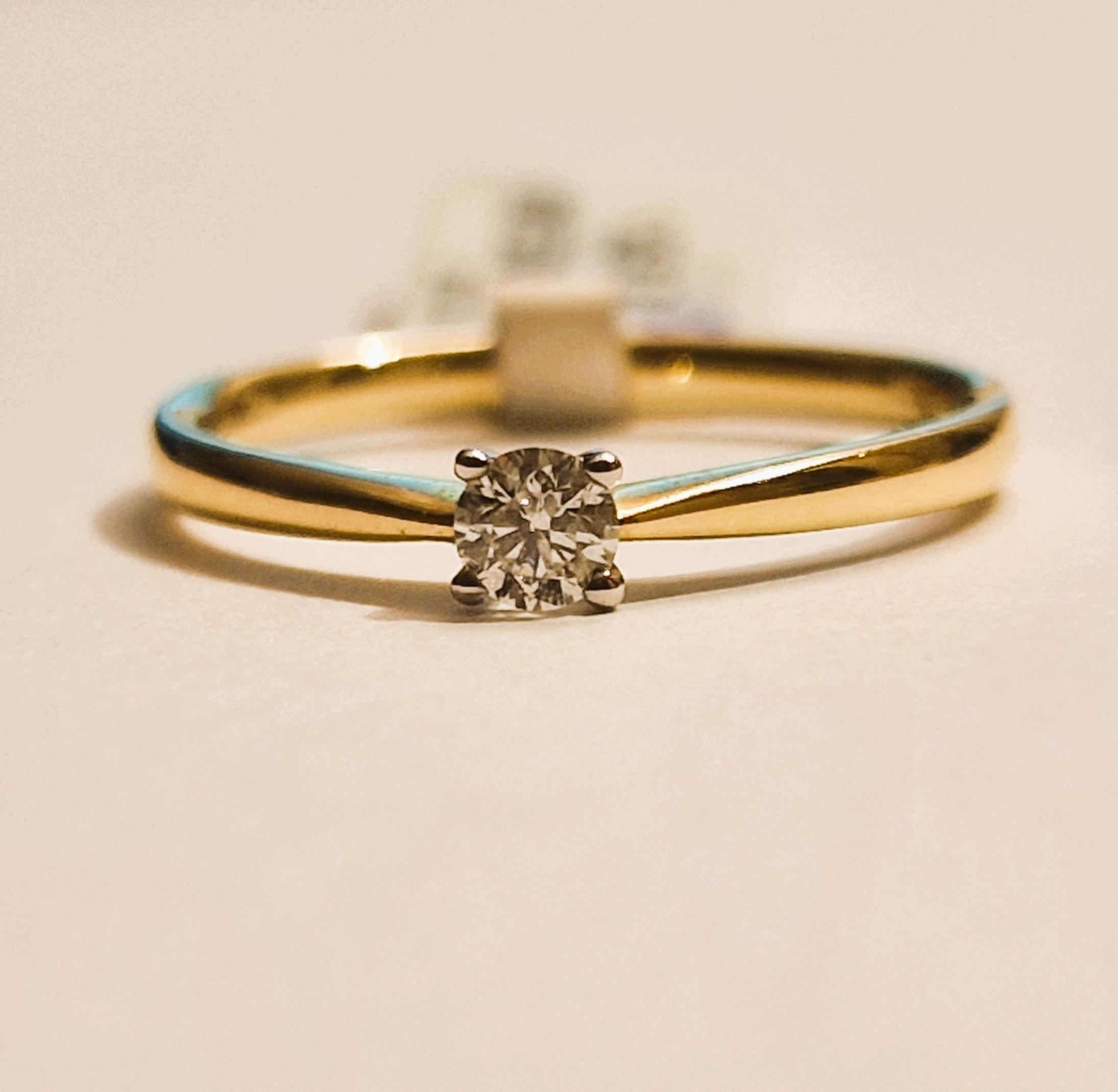 14k bicolor solitaire met diamant 0.15 crt