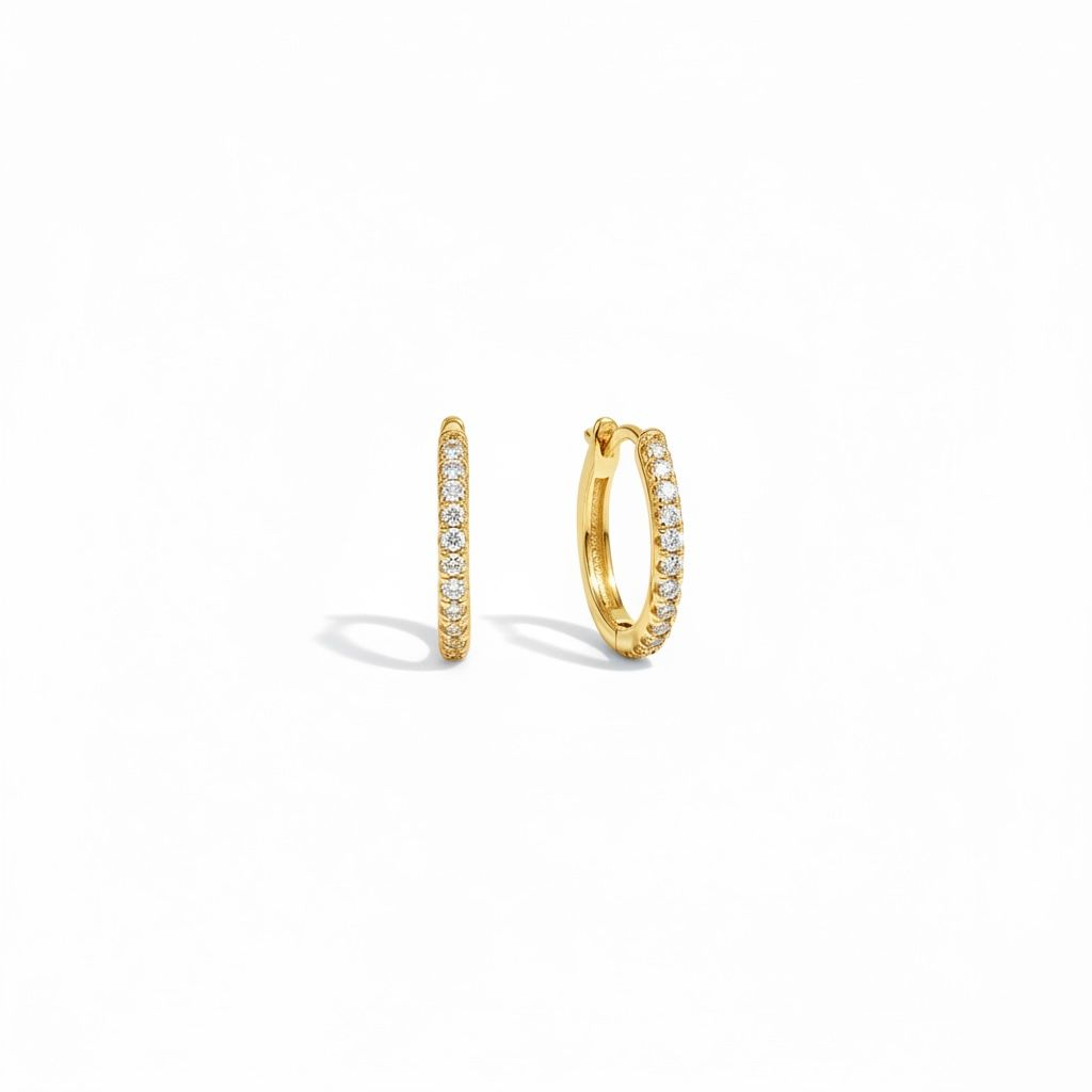 14 karaat geelgouden creolen met briljant met een totaal van 0.08 caraat.