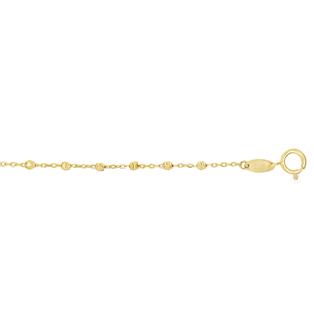 Het product "14 Karaats Geelgouden armband Ankerschakel met Bolletjes - 19.5 cm" is een verfijnde armband met ankerschakels en subtiele bolletjes. Gemaakt van 14 karaats goud, straalt het luxe en elegantie uit. Draag deze armband afzonderlijk voor een subtiele look of combineer met andere sieraden voor een trendy layered effect.