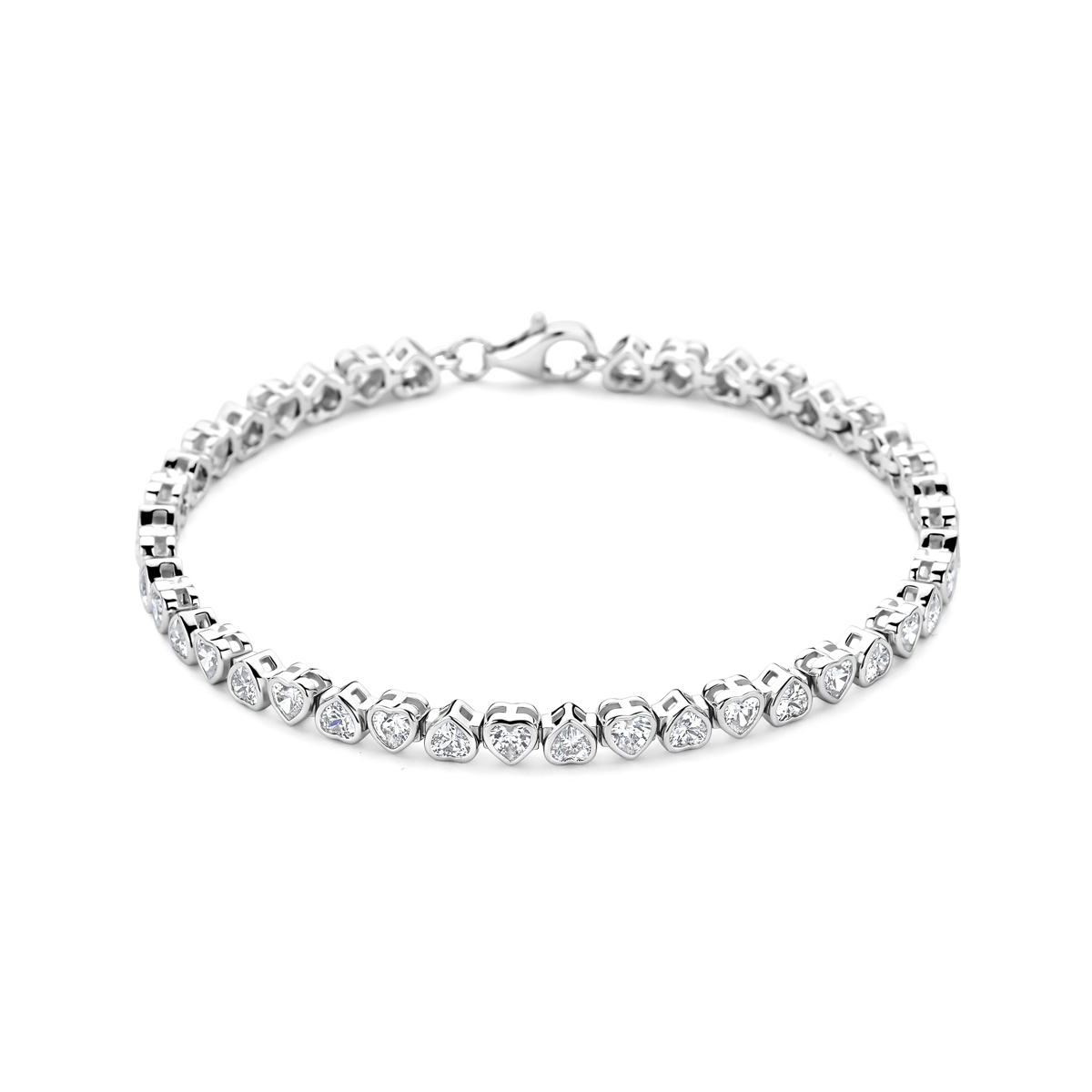 Gerhodineerd 925 zilveren tennisarmband met zirkonia hartjes. De armband heeft een schakelbreedte van 4mm en een draaglengte van 18cm. Uitgevoerd met karabijnsluiting.