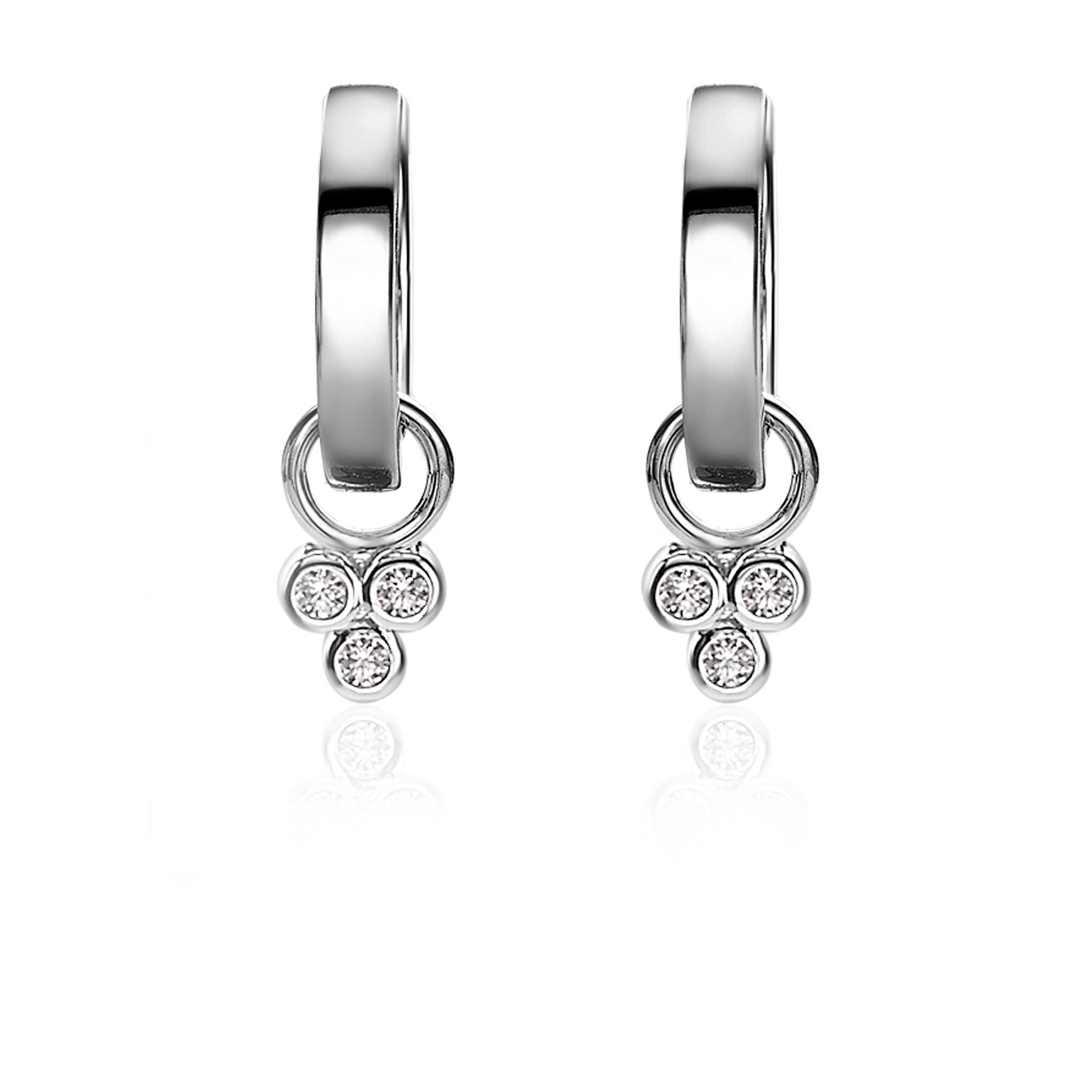 ZINZI zilveren oorbedels met drie ronde zettingen bezet met witte zirconia's. De afgebeelde oorringen zijn niet bij de prijs inbegrepen. Vervaardigd van eerste gehalte zilver (925) en met extra rodiumlaag voor een langdurige glans.
