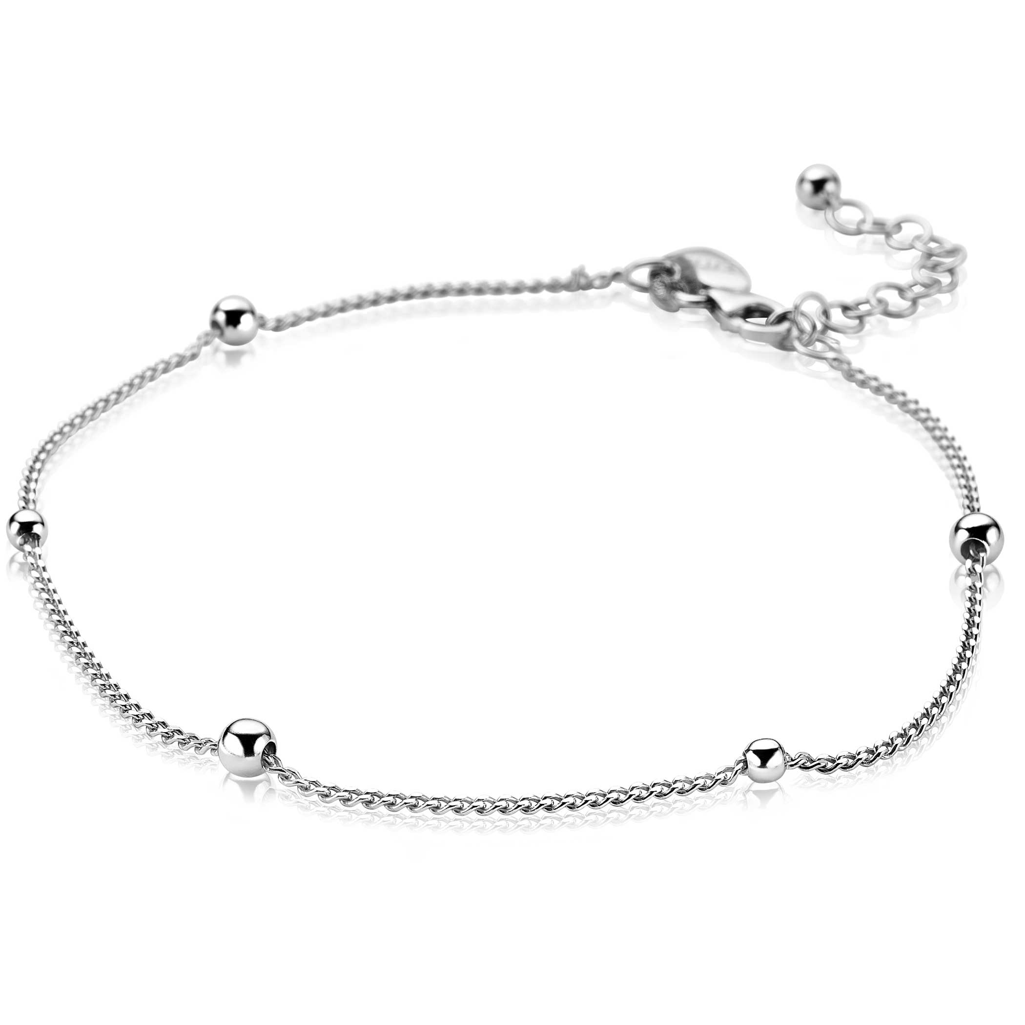 De ZINZI zlv. gourmet enkelband ZIE987 heeft een elegante uitstraling met zilveren bolletjes. Het enkelbandje heeft een lengte van 23+4 cm, waardoor het comfortabel om de enkel draagt. Perfect om te combineren met andere sieraden voor een stijlvolle look. Gemaakt van zilver en met een breedte van 4 mm, is het een verfijnde toevoeging aan elke outfit.
