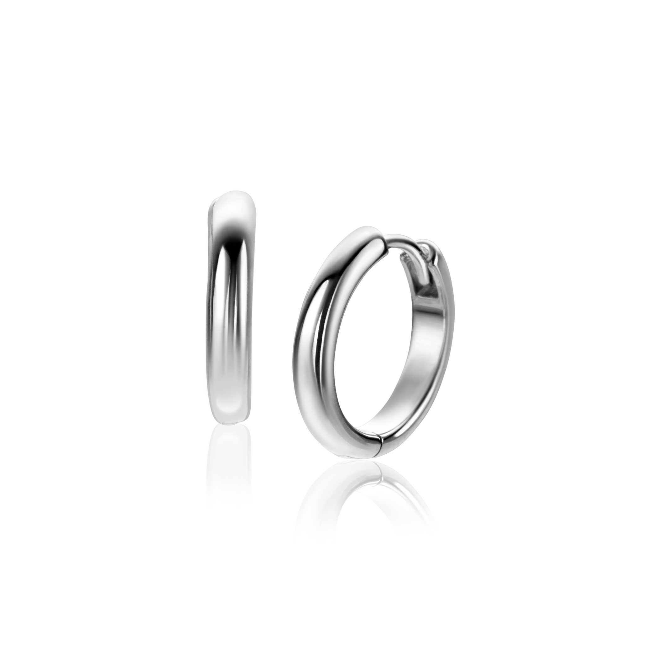 De ZINZI zlv. klapcreolen met modelnummer ZIO2601 zijn stijlvolle oorbellen van 925 sterling zilver, zilverkleurig en nieuw in de collectie. Deze half ronde buiscreolen meten 16,5x3mm. Perfect om dagelijks te dragen of voor speciale gelegenheden. Combineer ze met andere zilveren sieraden voor een elegante uitstraling. Ideaal voor zowel casual als chique outfits.