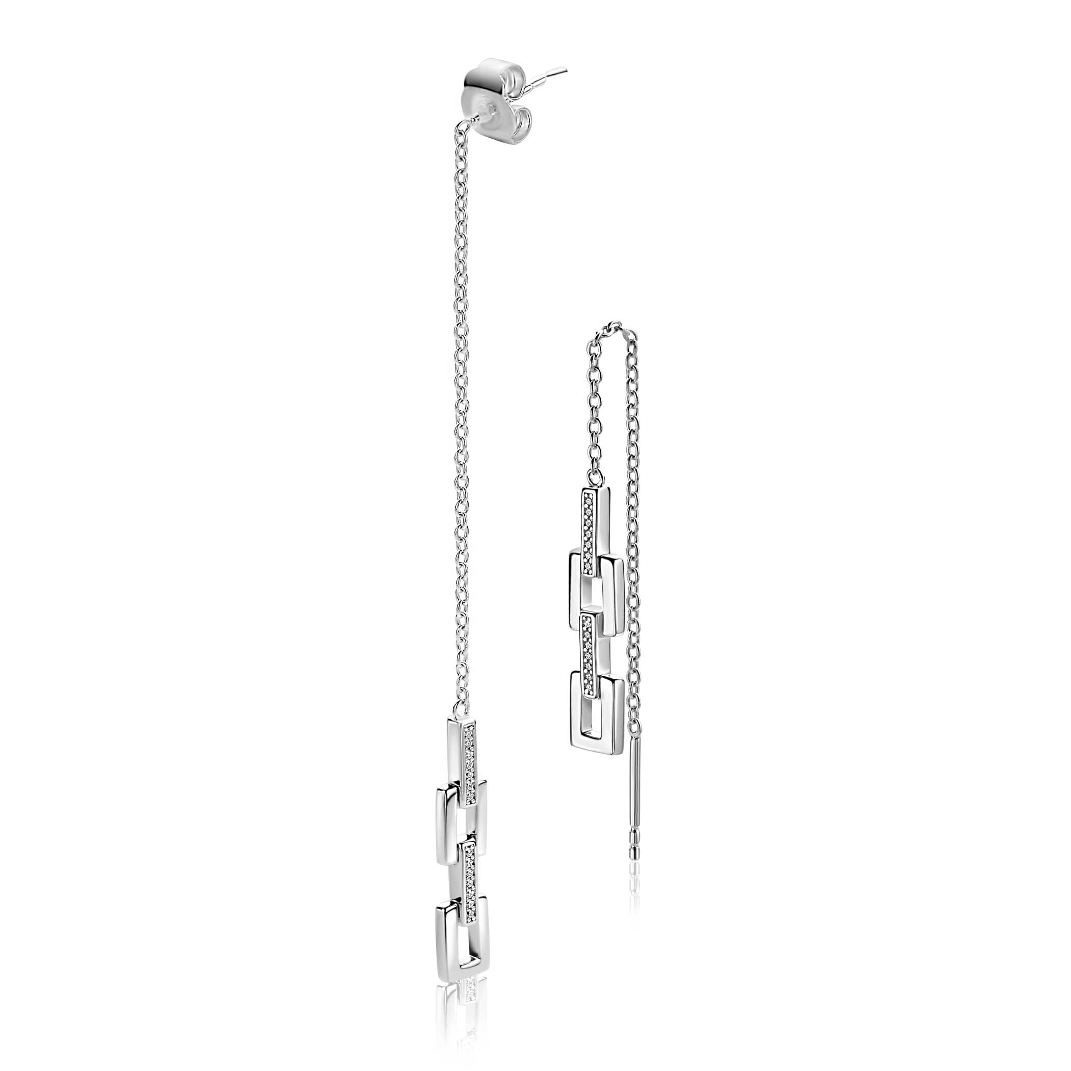 ZINZI zilveren trendy doortrek oorbellen (85mm) met vierkante schakels, bezet met witte zirkonia's. Ook lang met poussette in het oor te dragen. Exclusief ontworpen door mode-ontwerper Mart Visser. Vervaardigd van eerste gehalte zilver (925) en met extra rodiumlaag voor een langdurige glans.