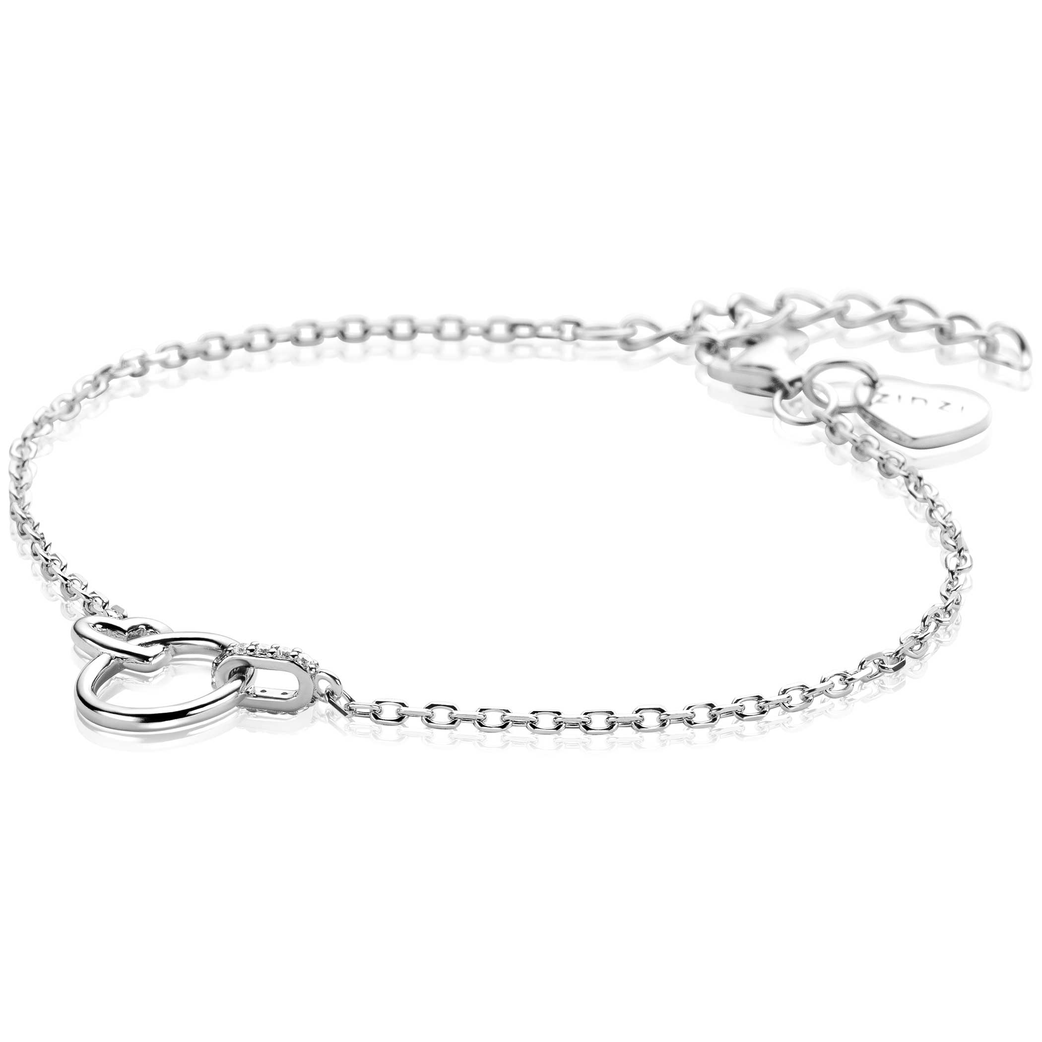 De ZINZI ZIA2811 armband is een verfijnd sieraad met een verbonden rond/hart/oog ontwerp bezet met zirconia's. Gemaakt van zilverkleurig zilver, straalt het elegantie en stijl uit. Deze armband is perfect om zowel casual als bij speciale gelegenheden te dragen, en kan solo gedragen worden of gecombineerd met andere zilveren sieraden voor een gelaagde look.