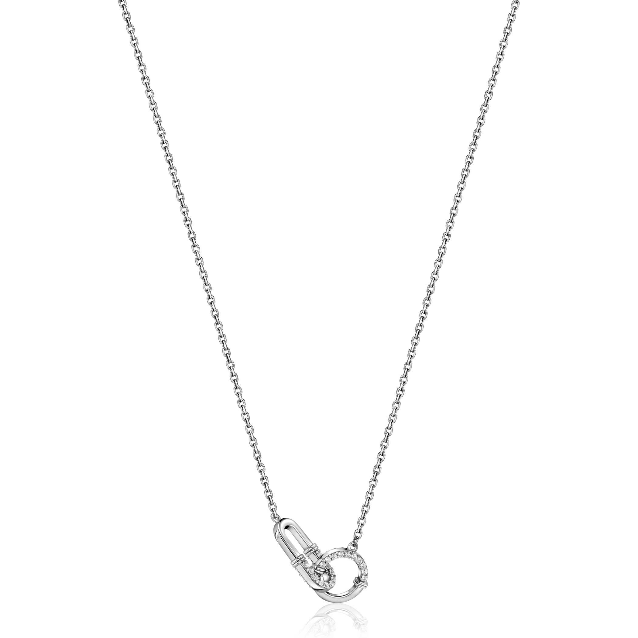 ZINZI zilveren ketting 45cm met paperclip- en ronde schakel bezet met witte zirconia's. De lengte van de ketting is verstelbaar van 42cm tot 45cm. Vervaardigd van eerste gehalte zilver (925) en voorzien van een extra rodiumlaag voor langdurige glans