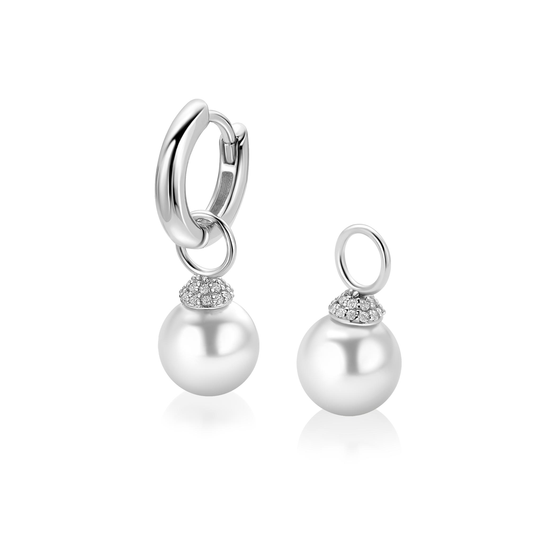 De ZINZI ZLV oorbedels (modelnummer ZICH2823) zijn zilverkleurige hangers. Ze zijn gemaakt van zilver en hebben een parel van 8 mm. Dit sieraad geeft uw look een elegante uitstraling. Draag deze pendelhanger aan een zilveren ketting of als oorbel voor een verfijnde stijl. Perfect voor dagelijks gebruik of speciale gelegenheden.