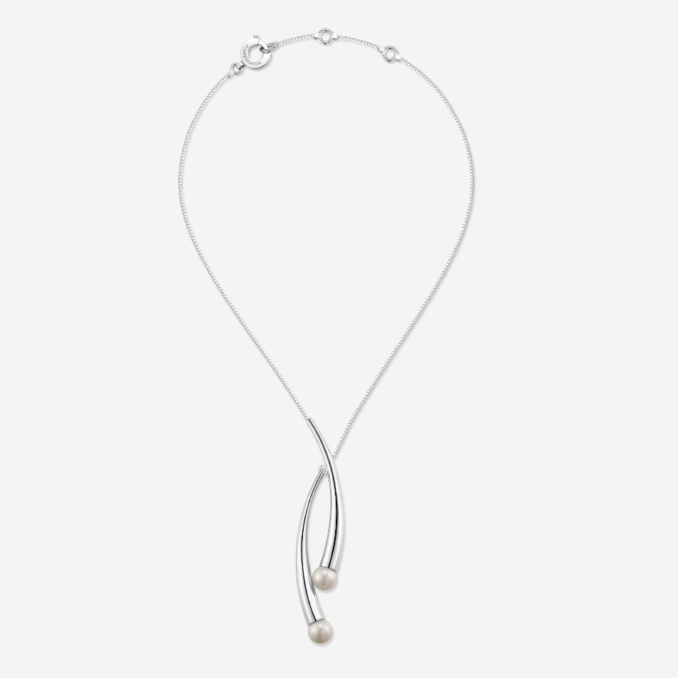 Details
Metals: 925&permil; Sterling silver
Stones: natural pearls 9mm
Necklace Size: 460mm
Collection: CUSPIS
Inspired by the thorn, a symbol of strength and protection, the collection expresses a deliberate contradiction of elements. Sterling silver crafted in sharp geometric shapes represents firmness and determination, while white or black pearl adds a touch of warmth and sophistication. This antithesis creates a dynamic interplay between stiffness and softness, resulting in innovative creations that draw from the beauty of nature and art.