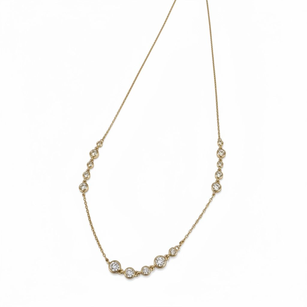 14 karaat geelgouden collier met 15 briljantjes van totaal 0.53 caraat,