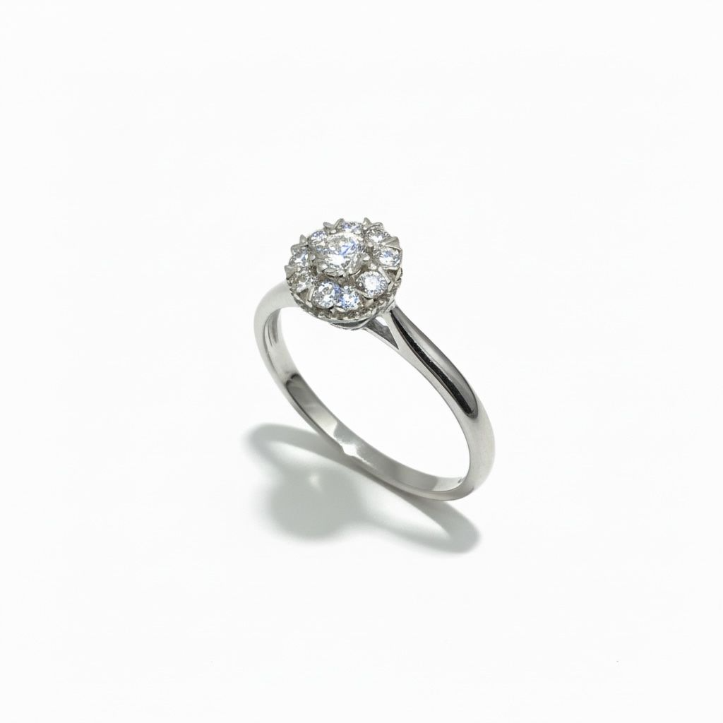 14 karaat witgouden ring met 9 briljantjes van totaal 0.34 caraat.