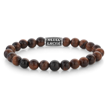 De Bordeaux Tiger Eye Bracelet van Rebel & Rose, te koop bij Van der Kooij, is een verfijnde en gedurfde keuze voor de moderne man. Deze armband is gemaakt van tijgeroog in een diepe bordeauxrode kleur, wat zorgt voor een rijke en luxe uitstraling. Het ontwerp van 8mm breed biedt een gedurfde, maar elegante look die perfect te combineren is met zowel casual als formele outfits. De stainless steel sluiting voegt een luxe afwerking toe en zorgt voor een comfortabele, veilige pasvorm. Met een gewicht van 22,8 gram heeft de armband een solide en luxe gevoel. De Bordeaux Tiger Eye Bracelet is ideaal voor heren die op zoek zijn naar een tijdloos sieraad met een verfijnde flair. Bij Van der Kooij profiteer je van gratis verzending en gratis retour in de winkel. Voeg deze luxe armband toe aan je collectie en geef je look een stoere, verfijnde uitstraling.