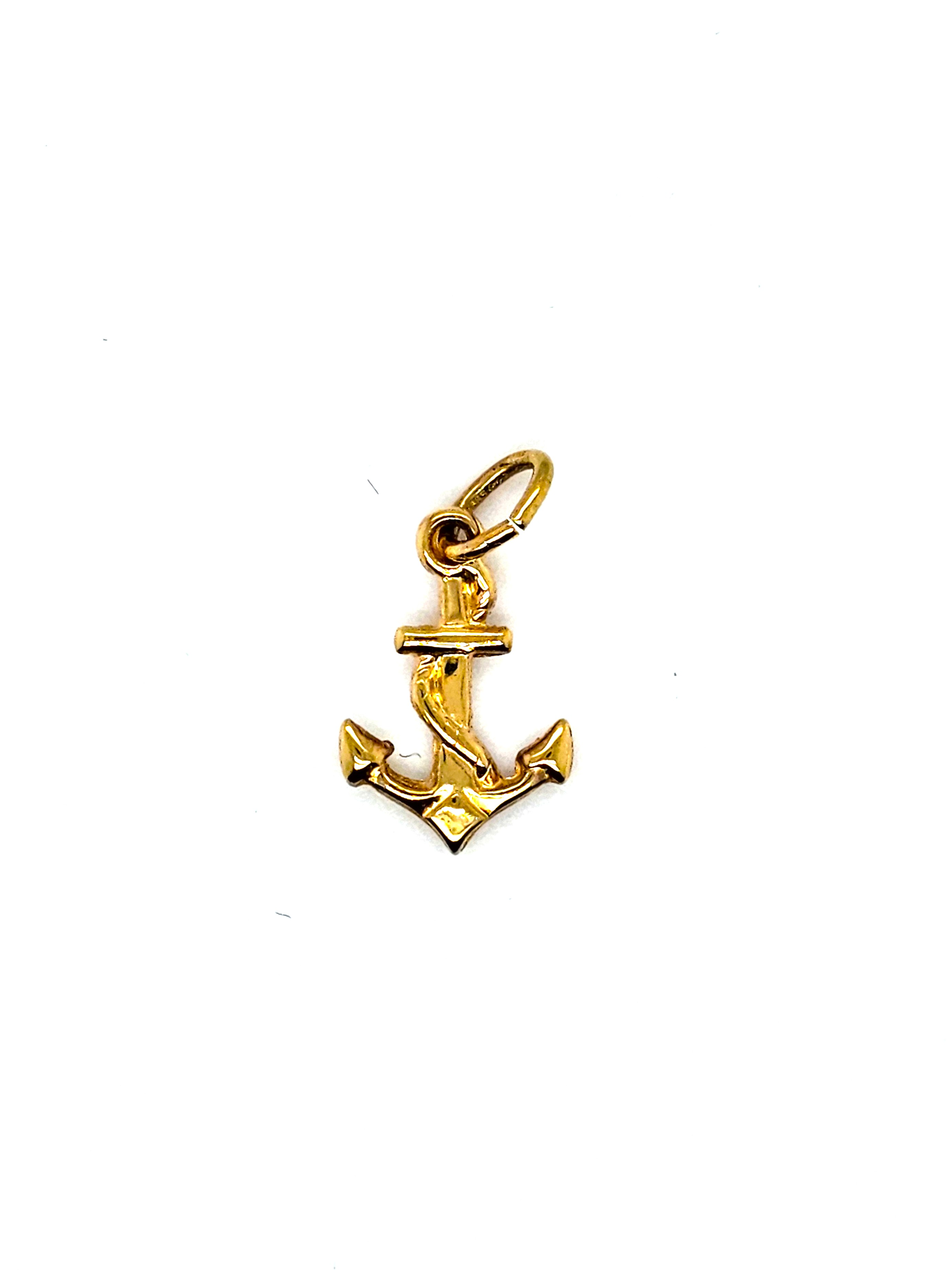 Deze gouden hanger met modelnummer GOUDEN HANGER ANKER is een prachtig sieraad dat behoort tot de categorie JUWEEL. Het is een pendant van goud en straalt luxe en elegantie uit. Draag deze hanger aan een elegante ketting voor een stijlvolle en verfijnde look, perfect voor zowel formele als informele gelegenheden.