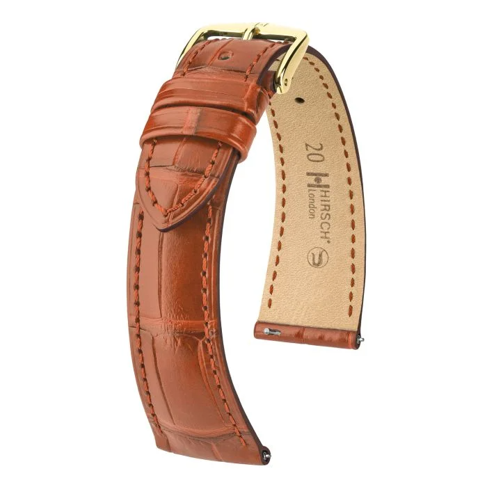 De Hirsch London Golden Brown Alligator 21mm is een exclusieve horlogeband van echt Louisiana alligatorleer in een warme goudbruine tint. De band heeft een elegante, tijdloze uitstraling en is afgewerkt met een comfortabele Hirsch Silkglove-voering en verfijnde details. Dankzij de hoogwaardige afwerking en het slanke profiel is deze 21 mm band perfect voor klassieke en luxe horloges.
