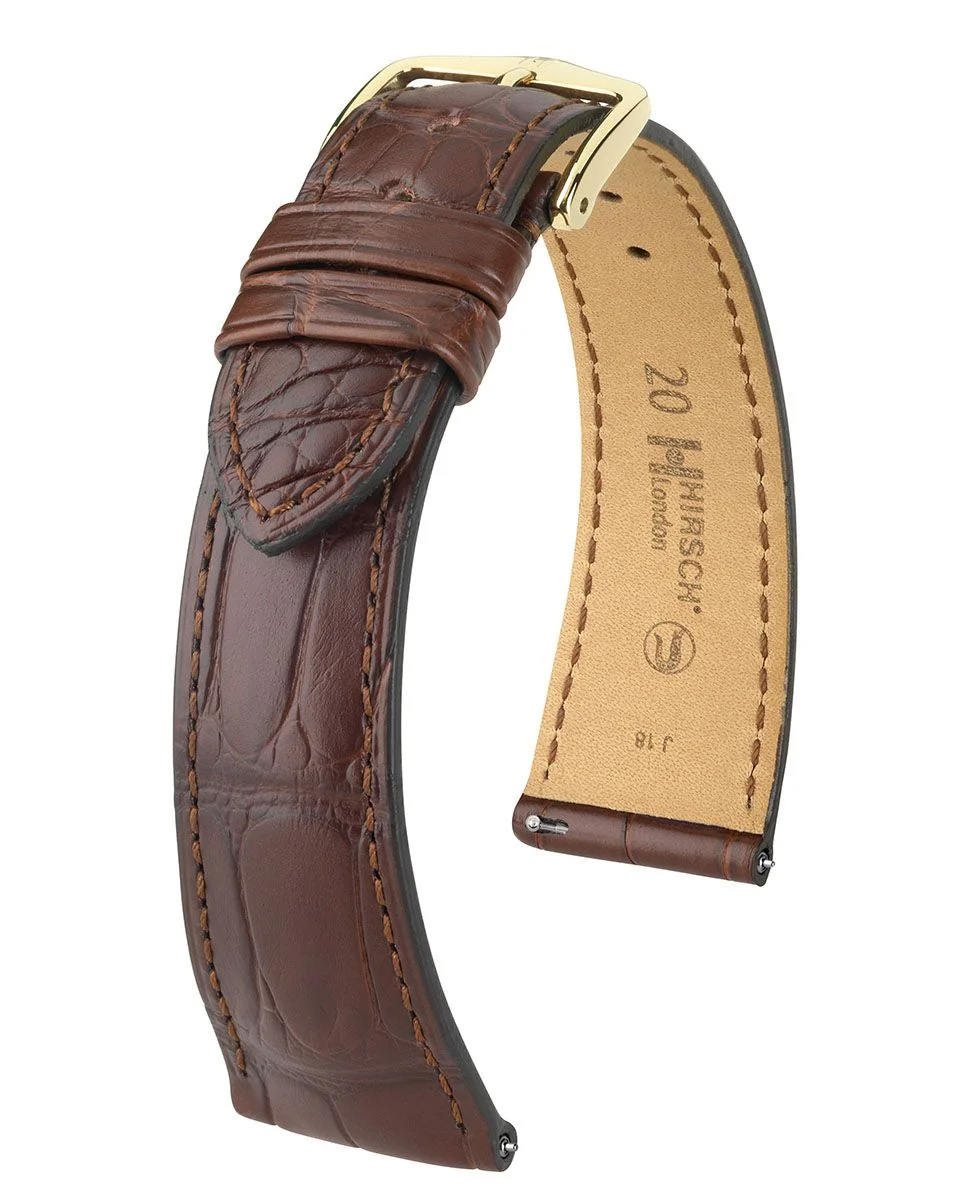 De Hirsch London NQR Brown Alligator 20mm is een luxe horlogeband van echt Louisiana alligatorleer in klassiek bruin, met een elegante matte afwerking en comfortabele Silkglove-voering.