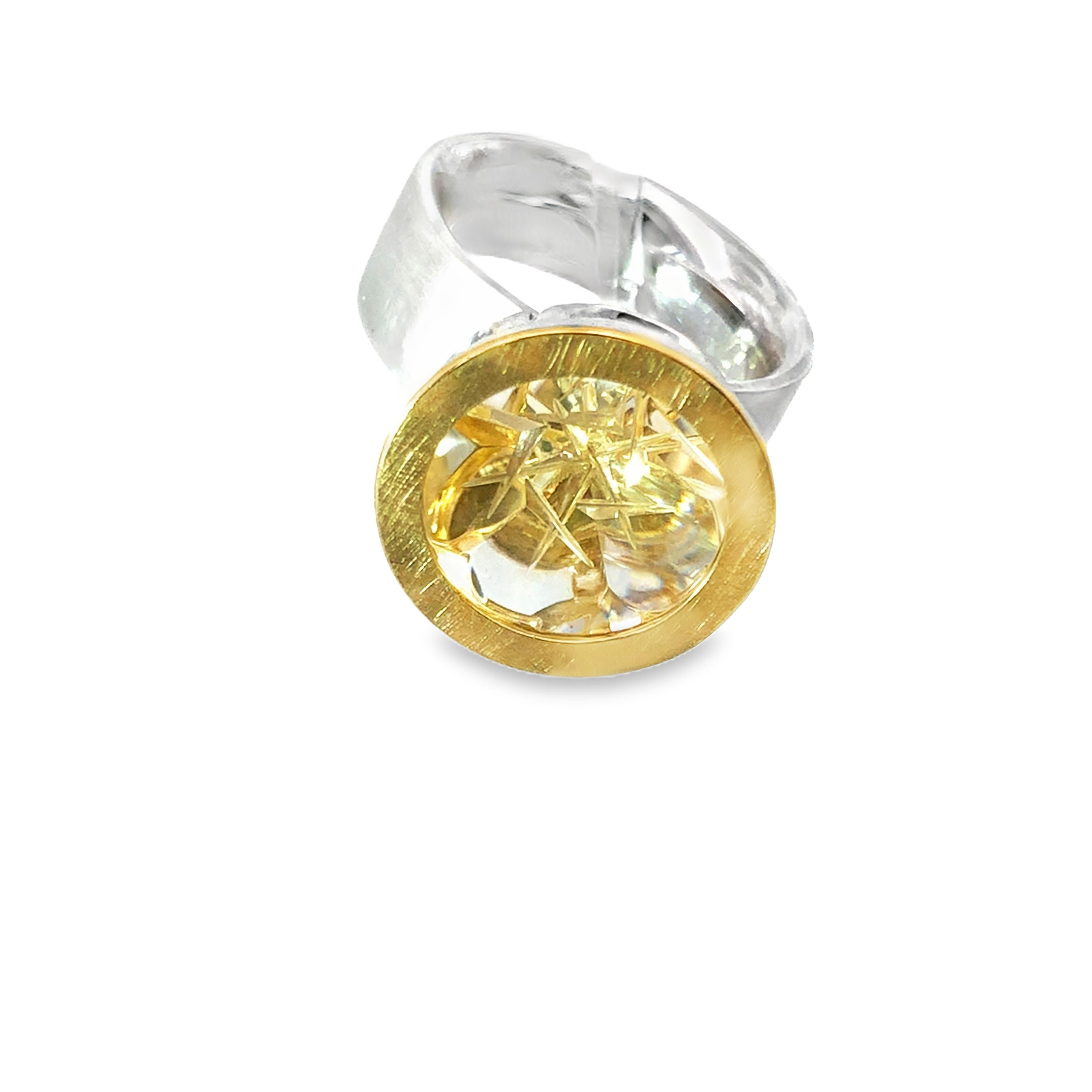 Dieser wundersch&ouml;ne Ring  ist ein einzigartiges Schmuckst&uuml;ck aus einer unbekannten Marke. Er besteht aus einer faszinierenden Kombination von Gold und Silber mit einem beeindruckenden Citrin von 11,57 ct. Die Ringgr&ouml;&szlig;e ist 58 und geh&ouml;rt zur Kategorie Schmuck. Tragen Sie ihn als elegantes Accessoire f&uuml;r besondere Anl&auml;sse oder als stilvolles Alltagsst&uuml;ck.