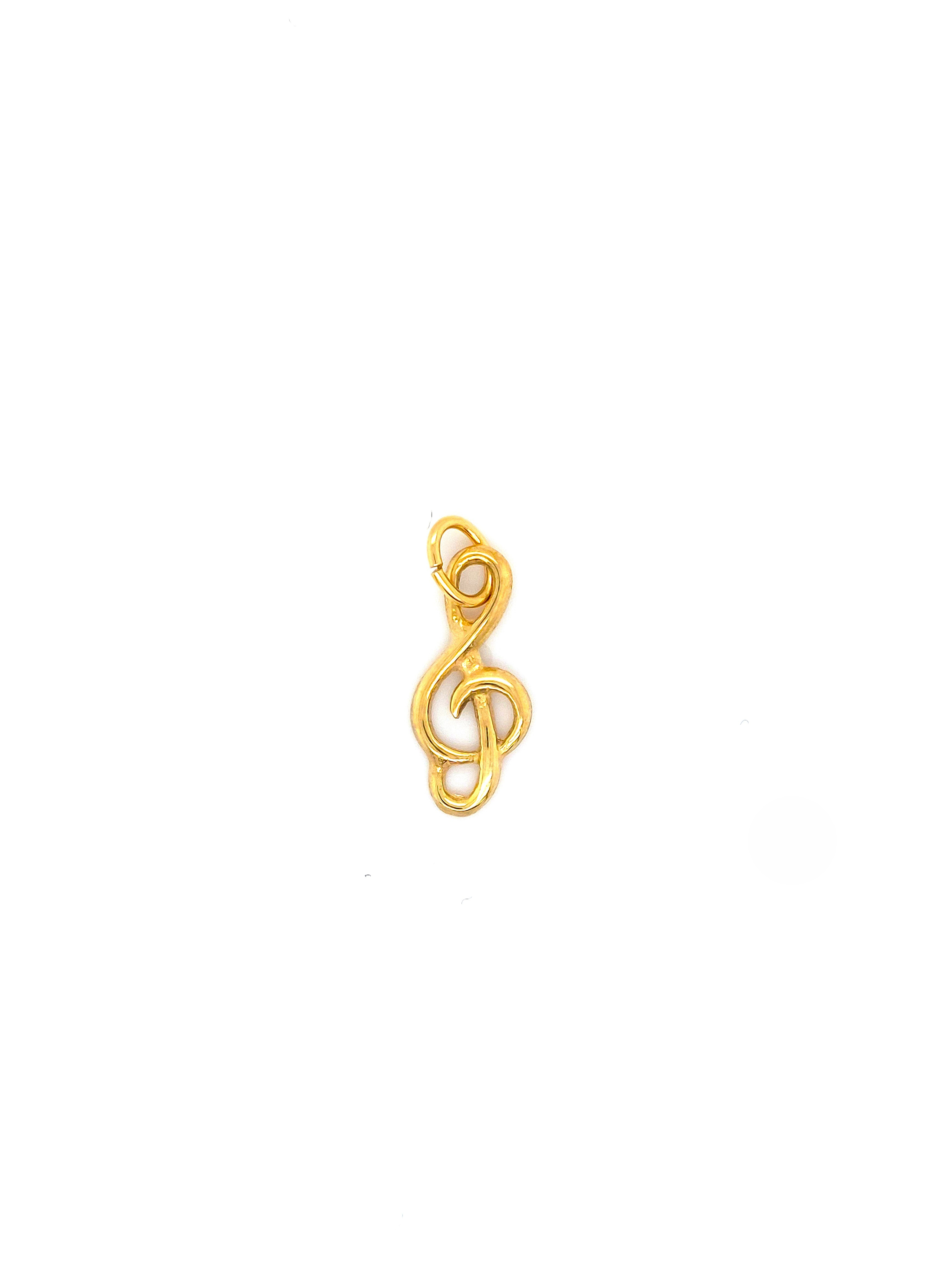 De Gouden Hanger Vioolsleutel is een schitterende hanger van een ongedefinieerd merk, perfect voor muziekliefhebbers. Dit juweel valt onder de categorie 'Sieraad' en is specifiek ontworpen als 'Hanger'. Draag deze stijlvolle hanger aan een ketting voor een subtiele, muzikale touch aan elke outfit. Ideaal voor zowel dagelijks als formeel gebruik. Voeg een vleugje muziek toe aan je stijl!