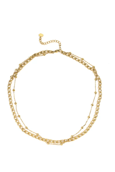 De Rose & Camellia Collier Edelstaal Verguld, modelnummer 1110335507996, is een verfijnde ketting van 38 + 5 cm. Deze gouden halsketting straalt elegantie en stijl uit. Draag hem als een opvallend sieraad bij zowel casual als formele kledingstukken om jouw look een luxueuze touch te geven.
