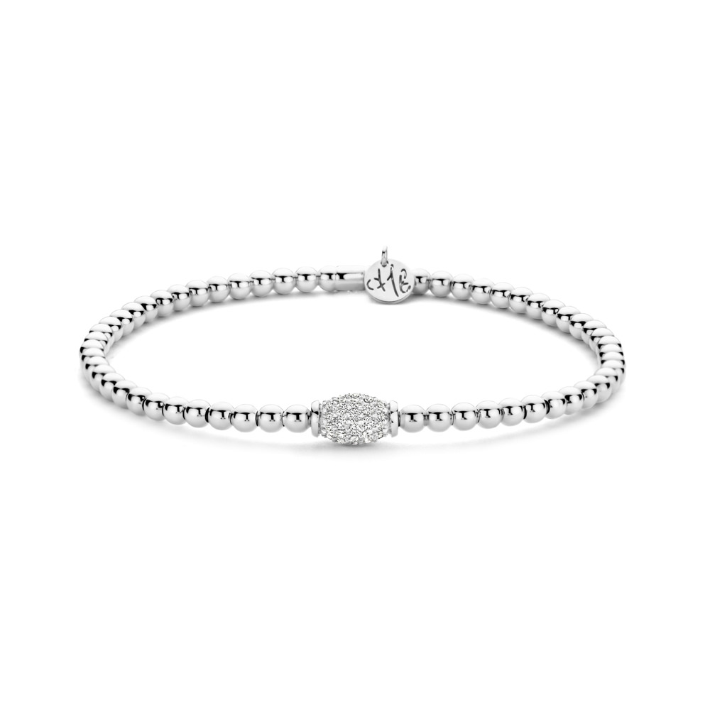 Hulchi Belluni elegante armband in 18 kt witgoud, verfijnd afgewerkt met fonkelende diamanten. Dankzij het comfortabele stretchdesign combineert dit tijdloze sieraad luxe met draaggemak.