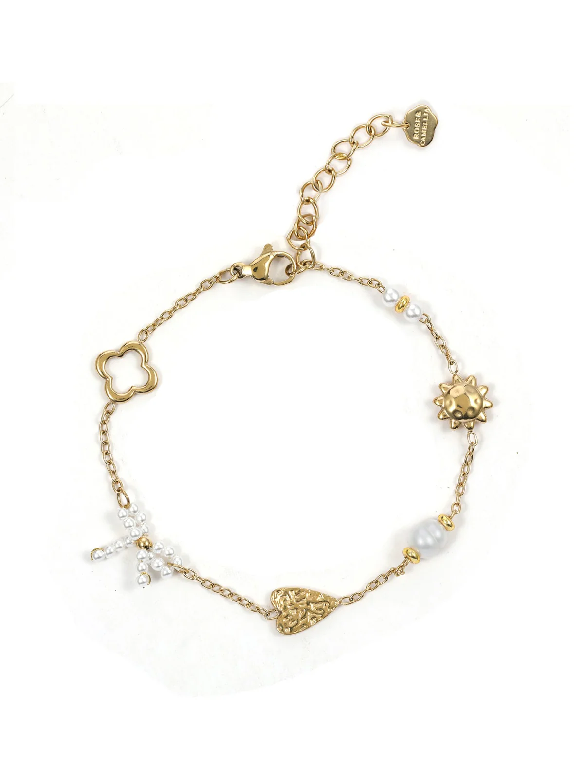 De Rose & Camellia Armband Pearl Combi, modelnummer 2110041408999, is een sierlijke toevoeging aan jouw juwelencollectie. Met elegante parels en een verfijnd ontwerp, biedt het een tijdloze uitstraling. Draag het enkel om je pols voor een subtiele en klassieke look, perfect voor zowel dagelijkse als formele gelegenheden. Een must-have sieraad dat elke outfit complimenteert.