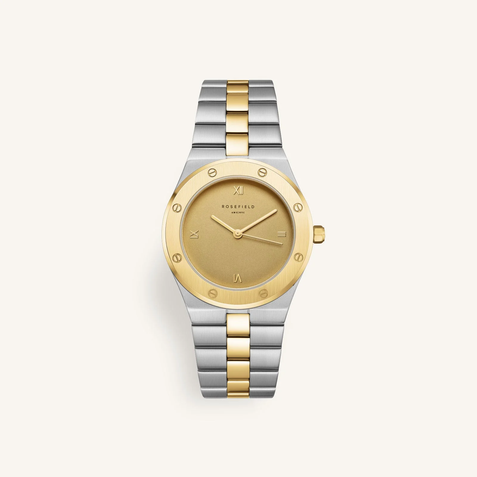 De Rose Cappuccino Matte Duotone Gold Silver horloge, modelnummer SPCDSD-SP05, heeft een metalen kast en band in goud-zilver kleur. Het heeft Romeinse cijfers op de wijzerplaat, geen licht- of datumfunctie, en een kastdikte van 7,7 mm. Waterdicht niveau 3. Draag het stijlvol bij formele en casual outfits voor een elegante uitstraling.