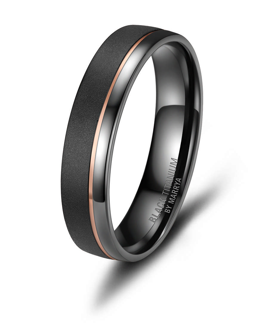 De zwarte titanium ring, model MT 67 (H-BT-04-67) van een onbekend merk, is een stijlvolle en moderne accessoire. Met zijn robuuste en lichte ontwerp past hij bij elke gelegenheid. Draag hem solo voor een minimalistische look of combineer met andere ringen voor een gedurfde statement. Perfect voor dagelijkse draagbaarheid en speciale gebeurtenissen.