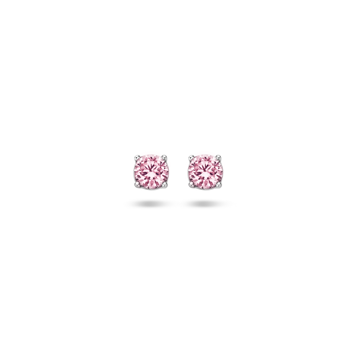 Zilveren oorknoppen met roze zirkonia.