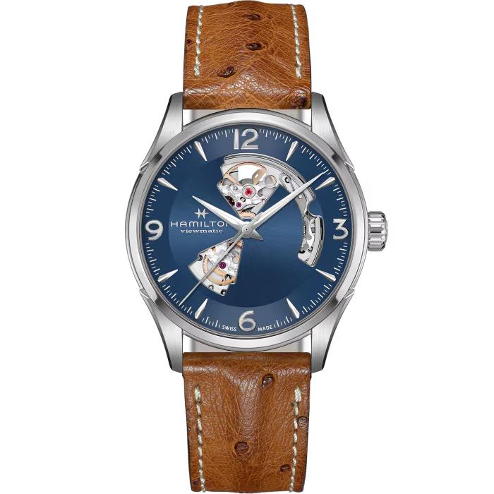 De Hamilton Jazzmaster Open Heart H32705041 is een elegante polshorloge met een Zwitserse automatische beweging en een analoge wijzerplaat. Het heeft een roestvrijstalen kast, saffierglas en een blauw wijzerplaat met Arabische indexen. Waterbestendig tot 5 ATM. Het wordt optimaal gedragen bij formele en zakelijke gelegenheden. Draag met vertrouwen en stijl.