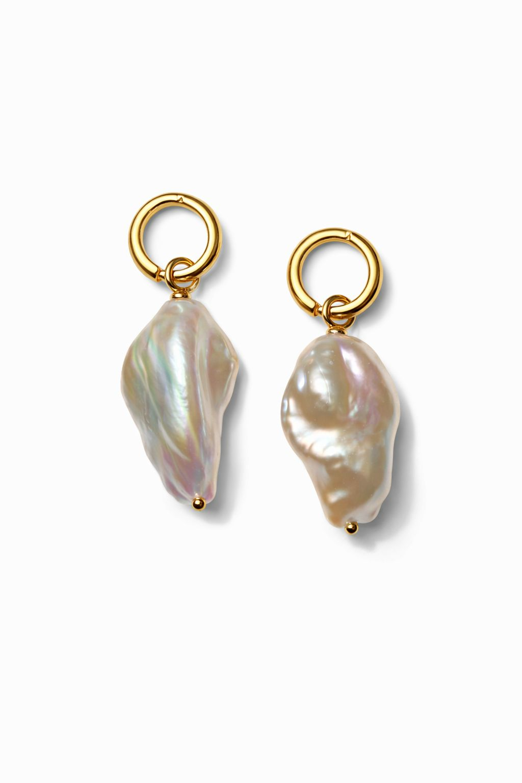 De Creolen Go, Wildparel (52+38), modelnummer E-24-64992, zijn prachtige hoepeloorbellen die deel uitmaken van de categorie sieraden. Deze elegante hoepeloorbellen stralen luxe uit en zijn perfect voor elke gelegenheid. Draag ze met opgestoken haar of bij een chique outfit voor een verfijnde en modieuze uitstraling.