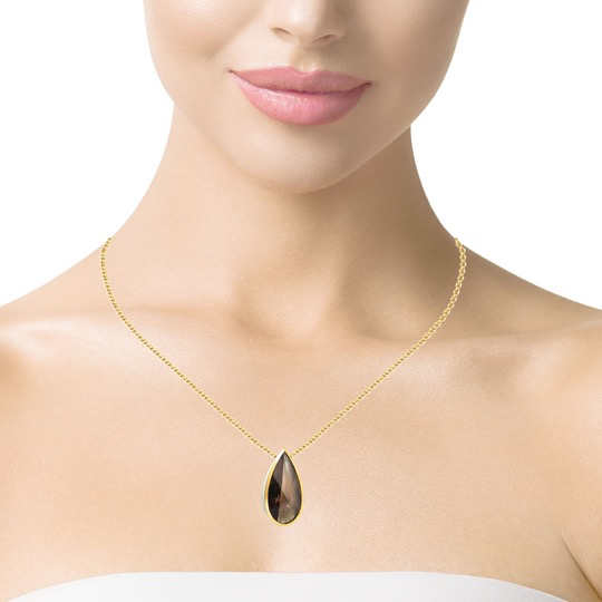 Der Anh&auml;nger Rauchquarz Silber/vergoldet, ist ein einzigartiges Schmuckst&uuml;ck, das zur Kategorie JEWEL geh&ouml;rt und als PENDANT mit Farbedelstein klassifiziert ist. Am besten wird dieser stilvolle Anh&auml;nger an einer eleganten Silber- oder Goldkette getragen, um jedes Outfit mit einem Hauch von Luxus zu veredeln.